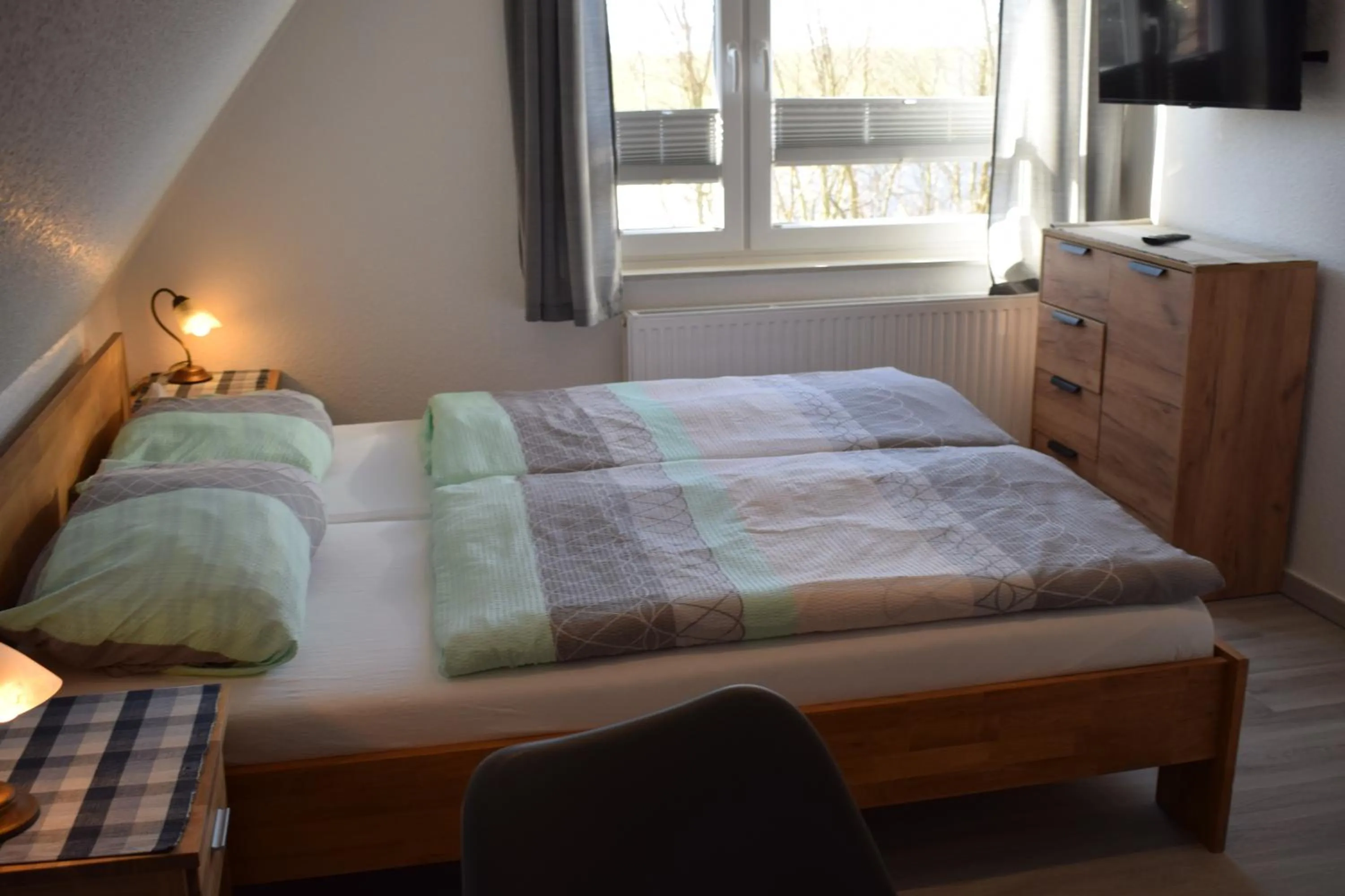 Living room, Bed in Hotel Haus am Meer