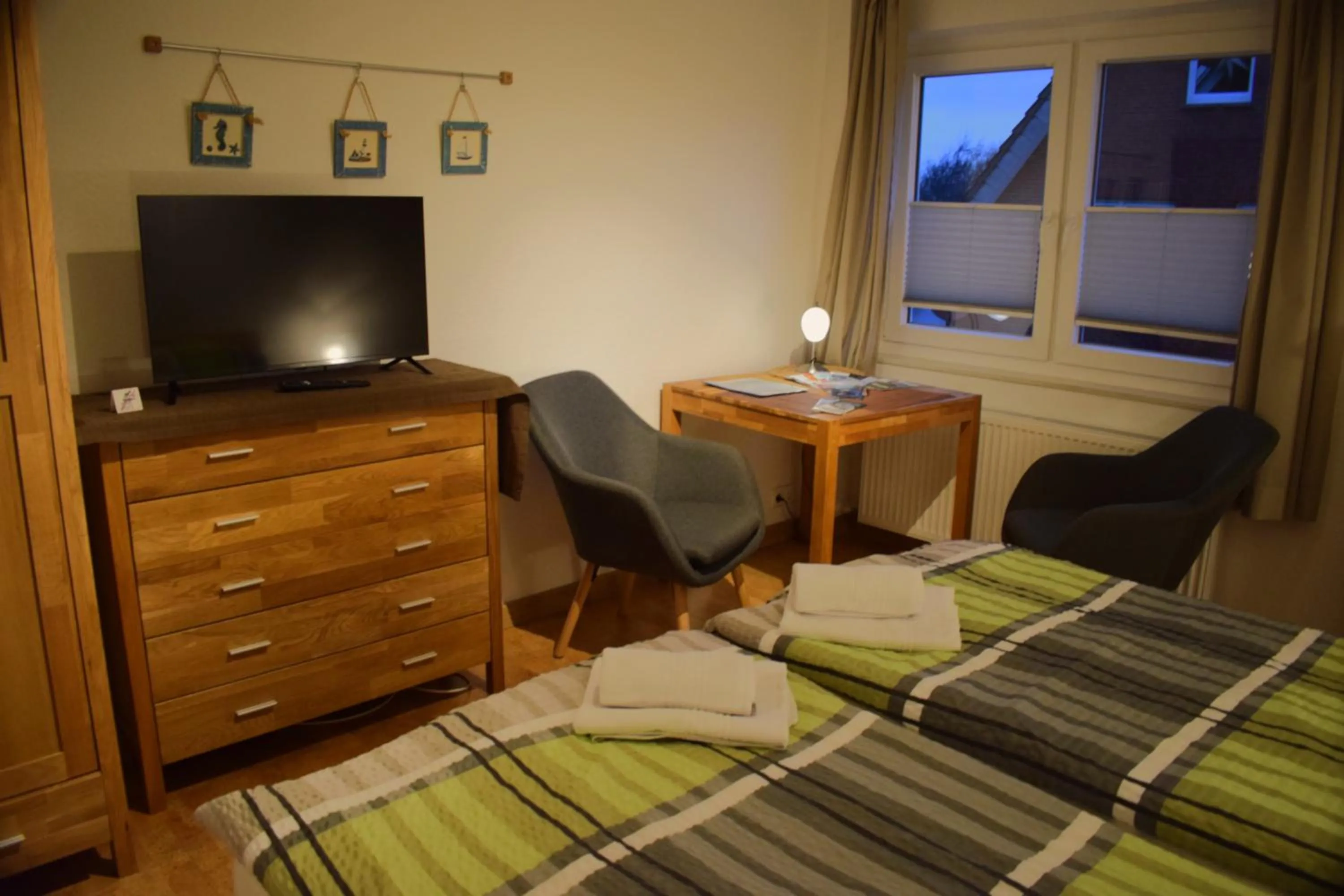 Living room, Bed in Hotel Haus am Meer
