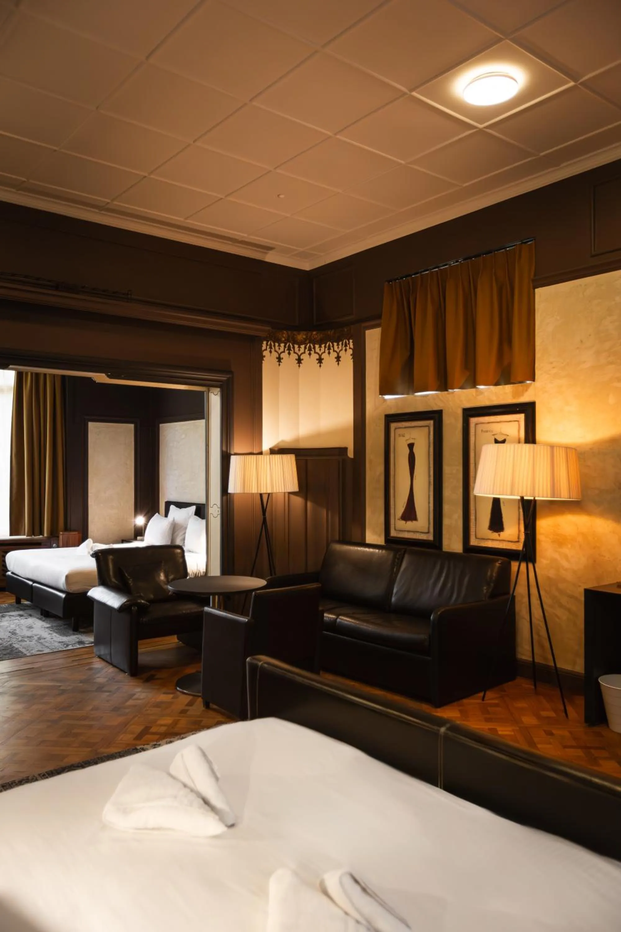 Living room, Bed in Hotel Orion