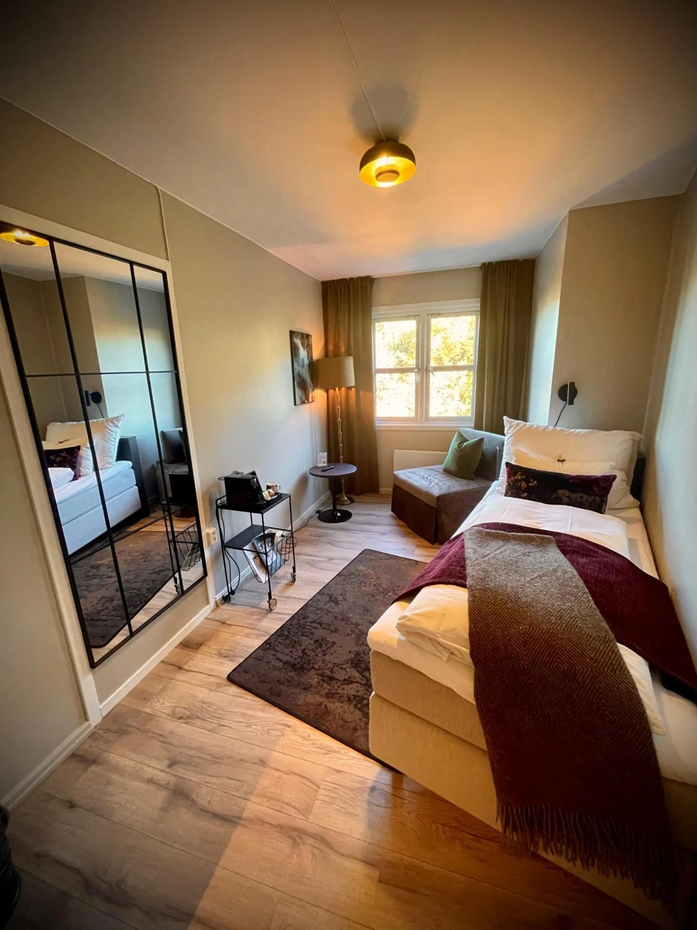 Bedroom, Bed in Aksjemøllen - by Classic Norway Hotels