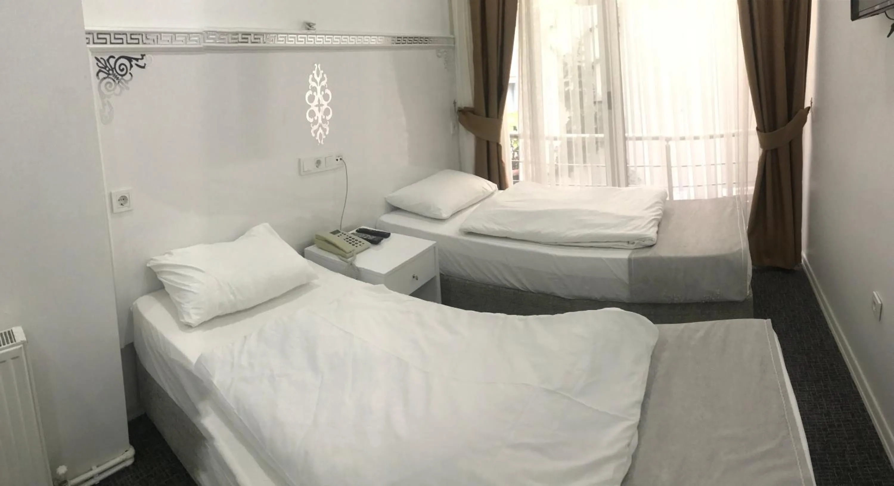 Bed in Beyhan Hotel