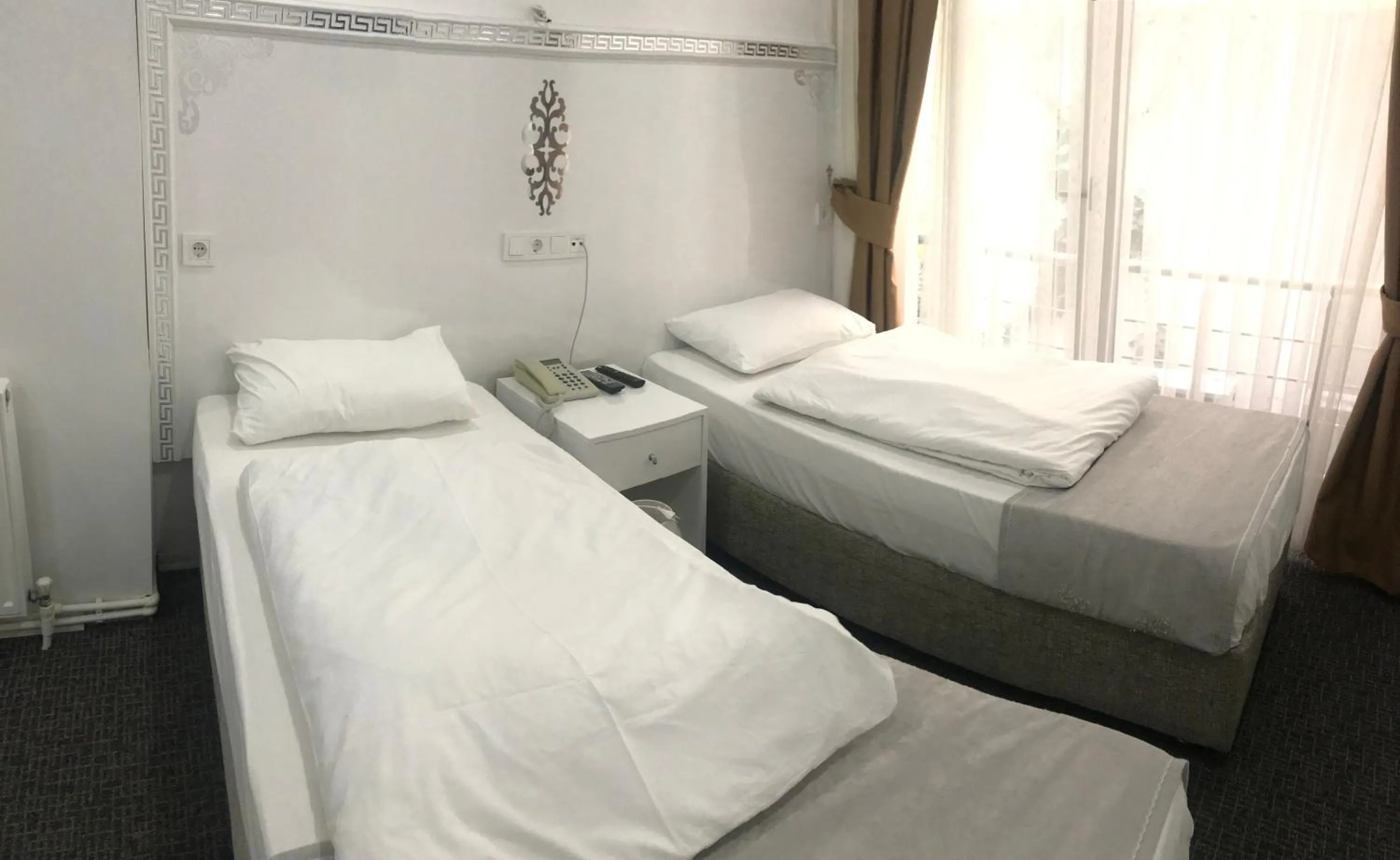 Bed in Beyhan Hotel