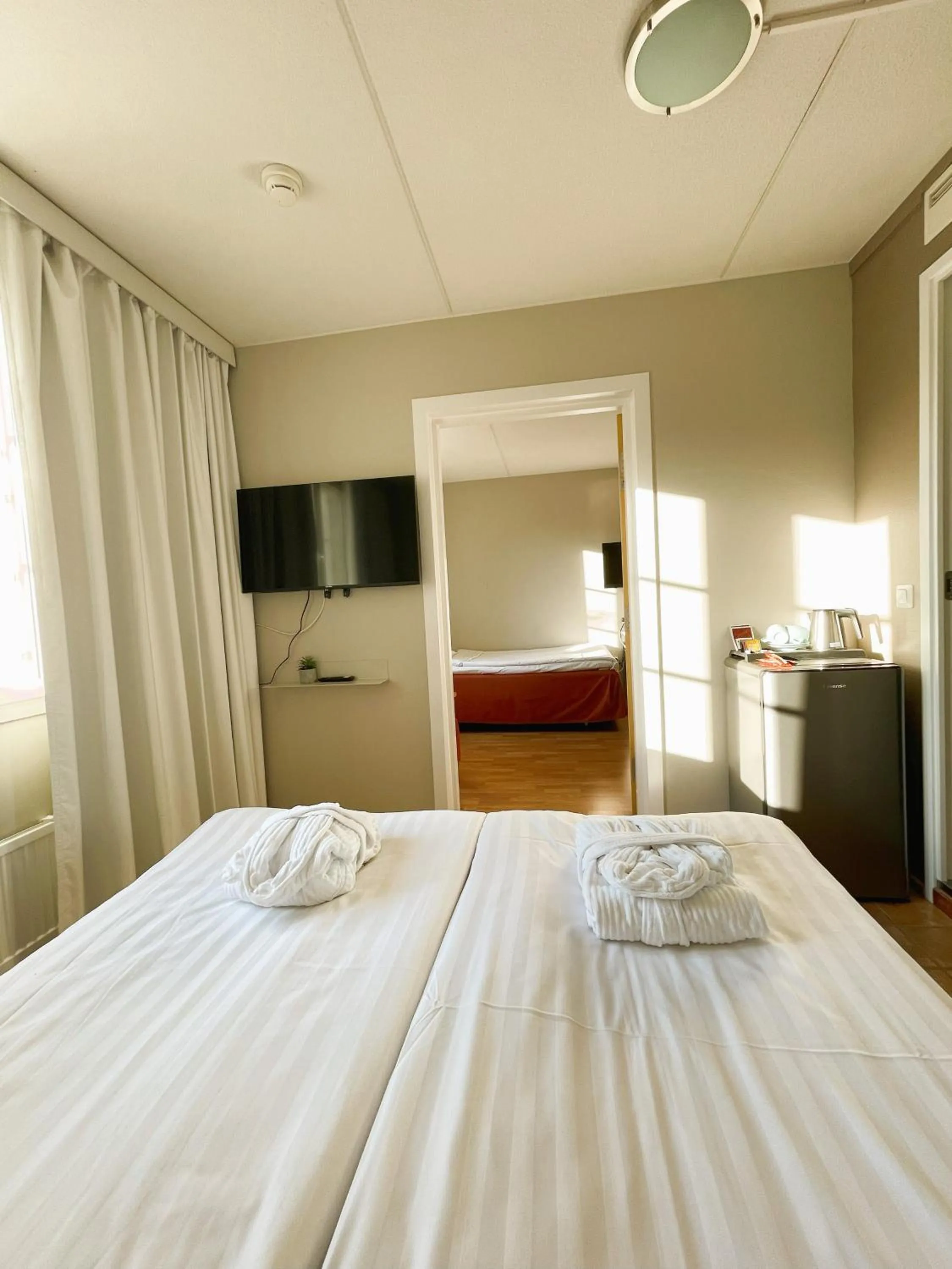 TV and multimedia, Bed in Hotel Jokipuisto