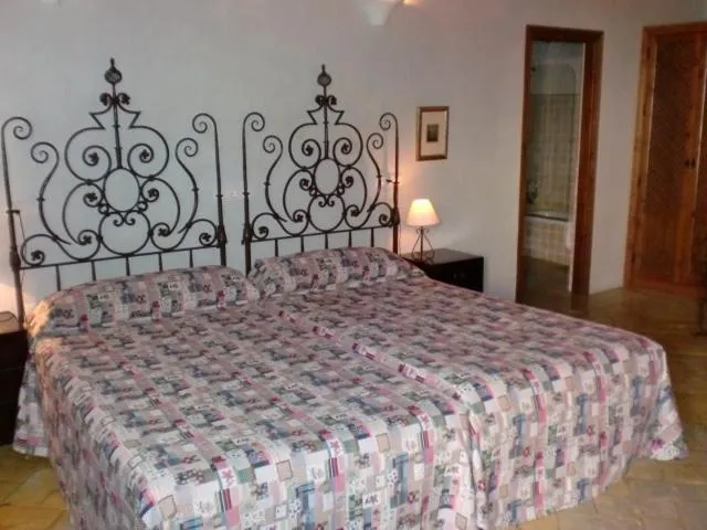 Bed in Hospedería del Monasterio