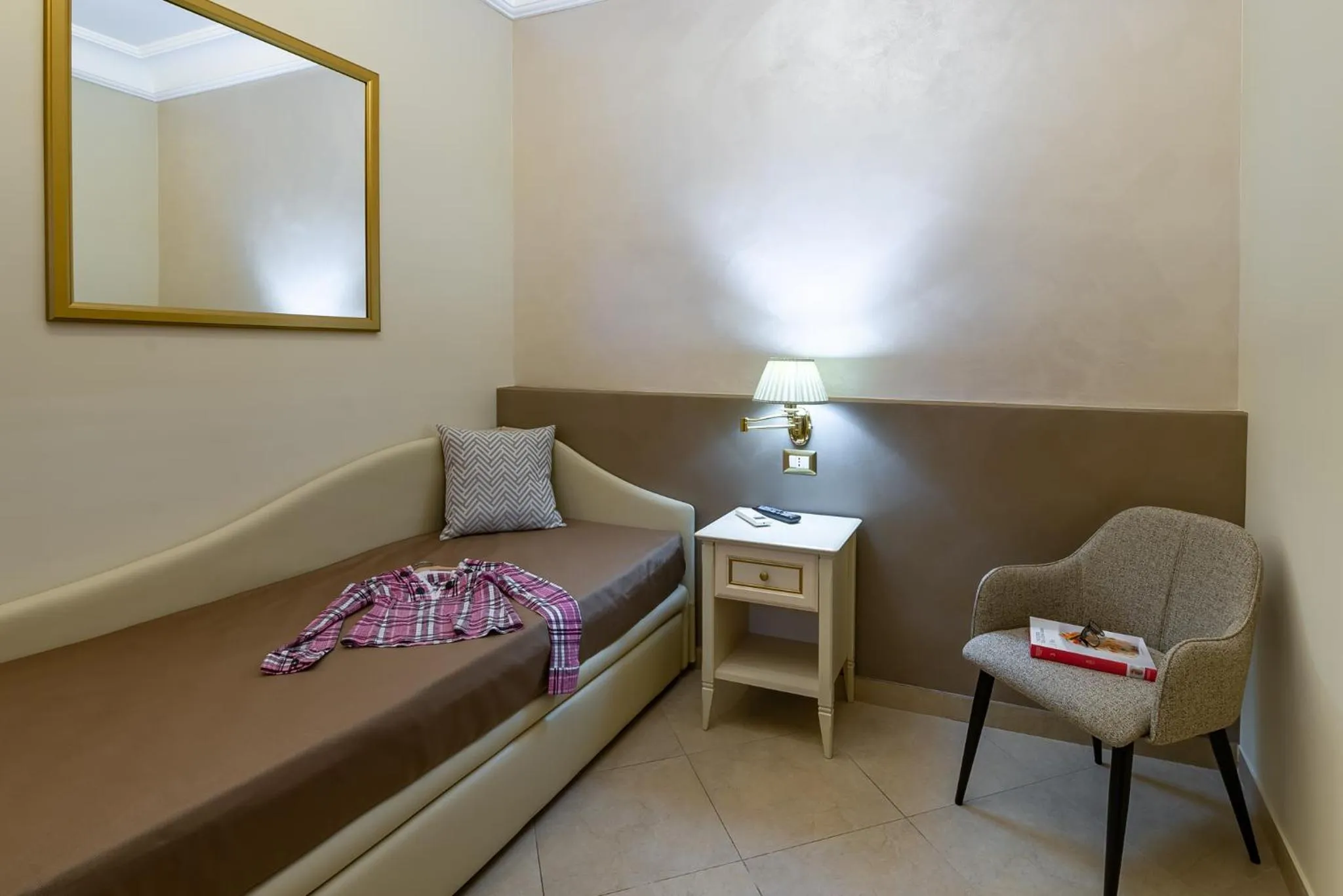 Bed in Vittorio Emanuele Boutique Hotel