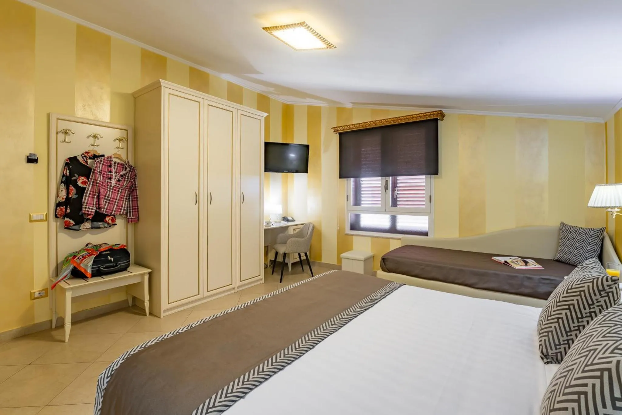 Bed in Vittorio Emanuele Boutique Hotel