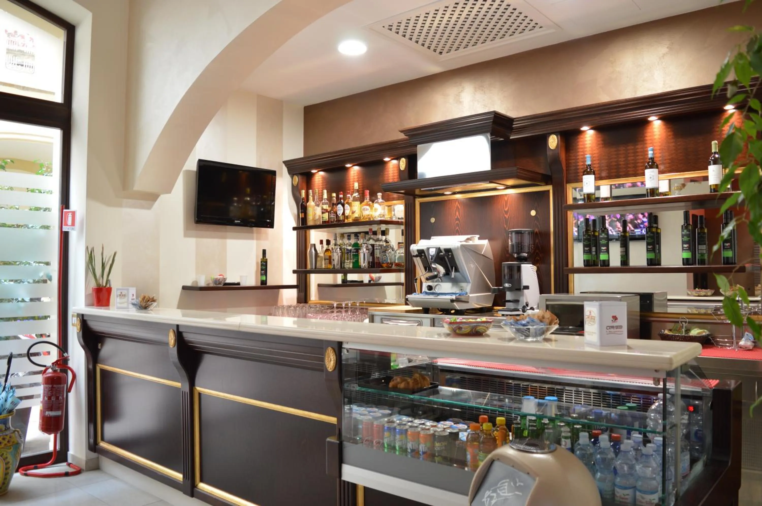 Lounge or bar in Vittorio Emanuele Boutique Hotel
