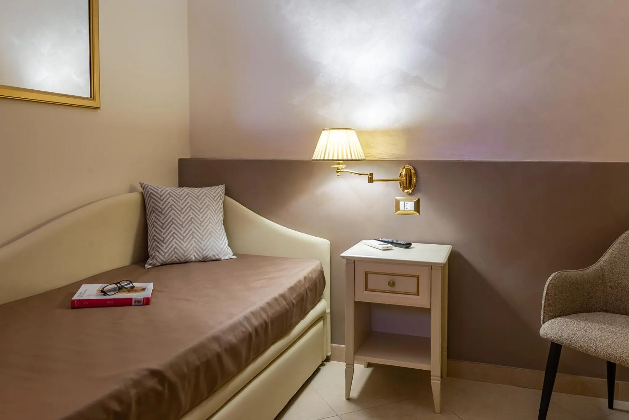 Bed in Vittorio Emanuele Boutique Hotel