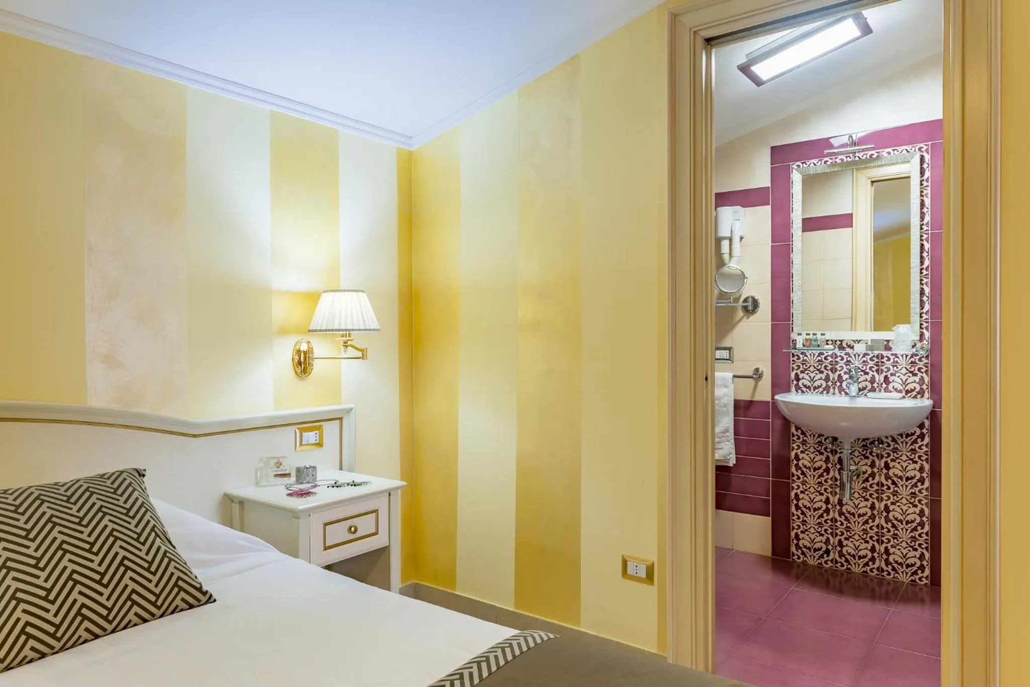 towels, Bed in Vittorio Emanuele Boutique Hotel
