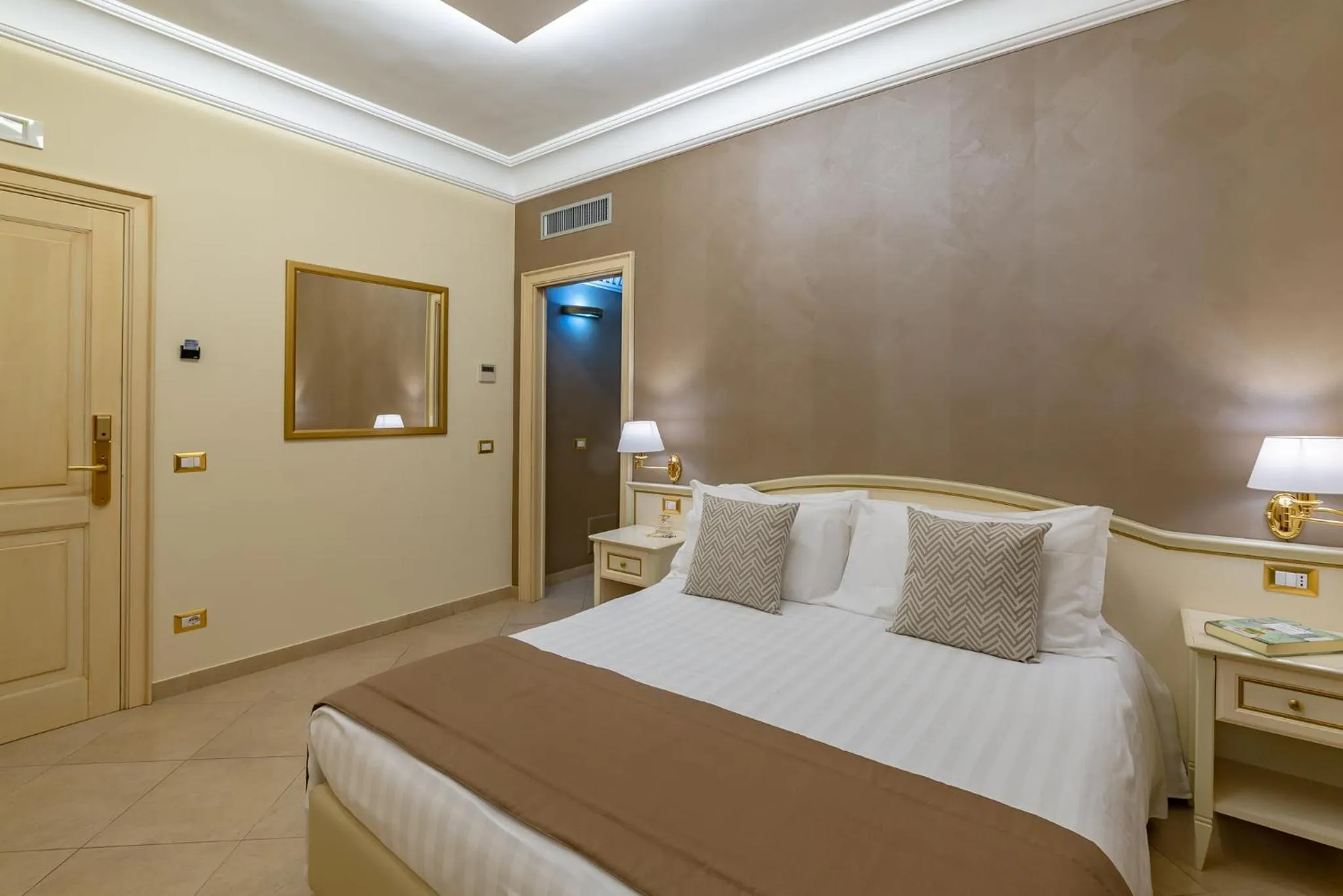 air conditioner, Bed in Vittorio Emanuele Boutique Hotel