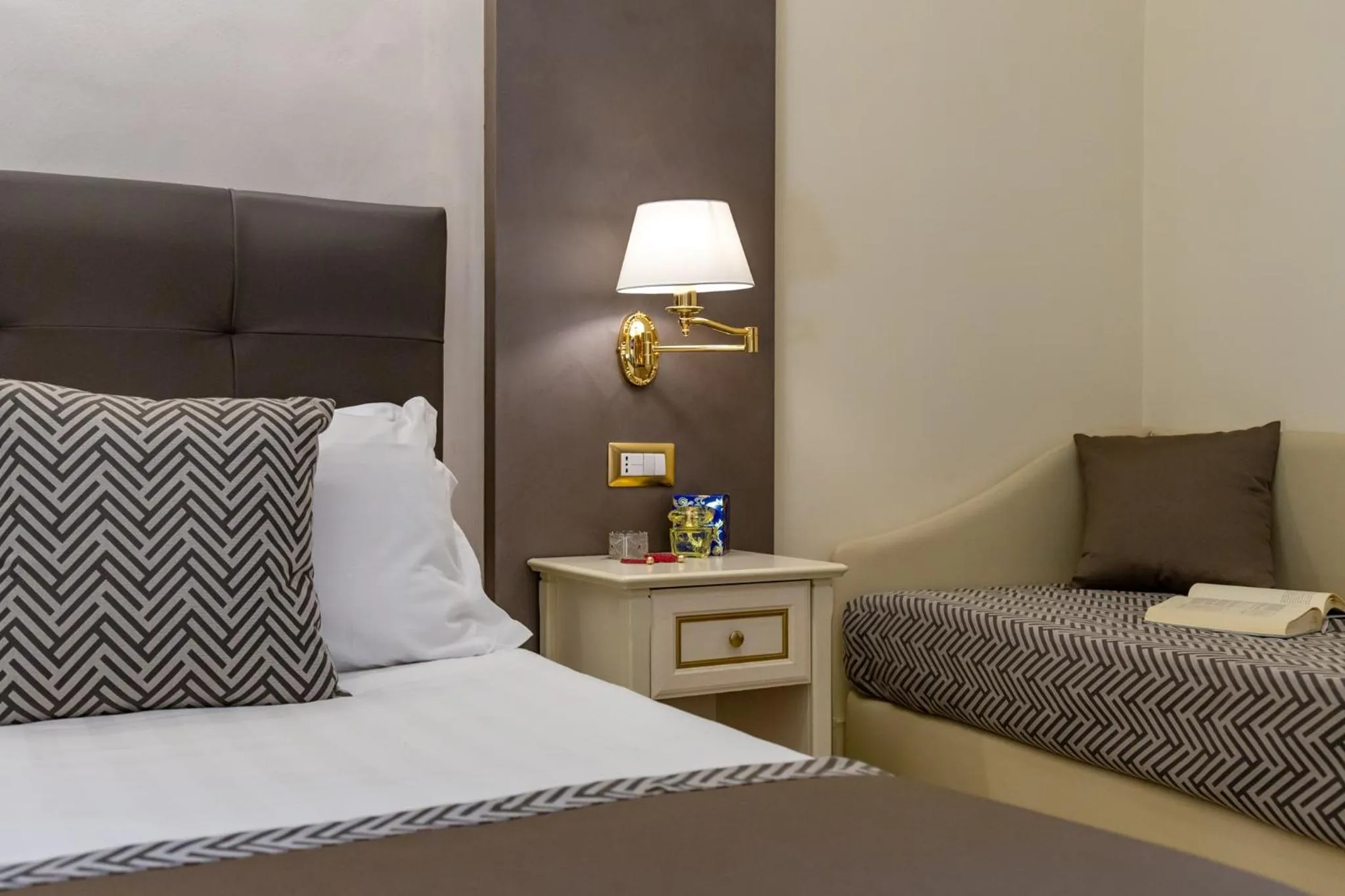 Seating area, Bed in Vittorio Emanuele Boutique Hotel