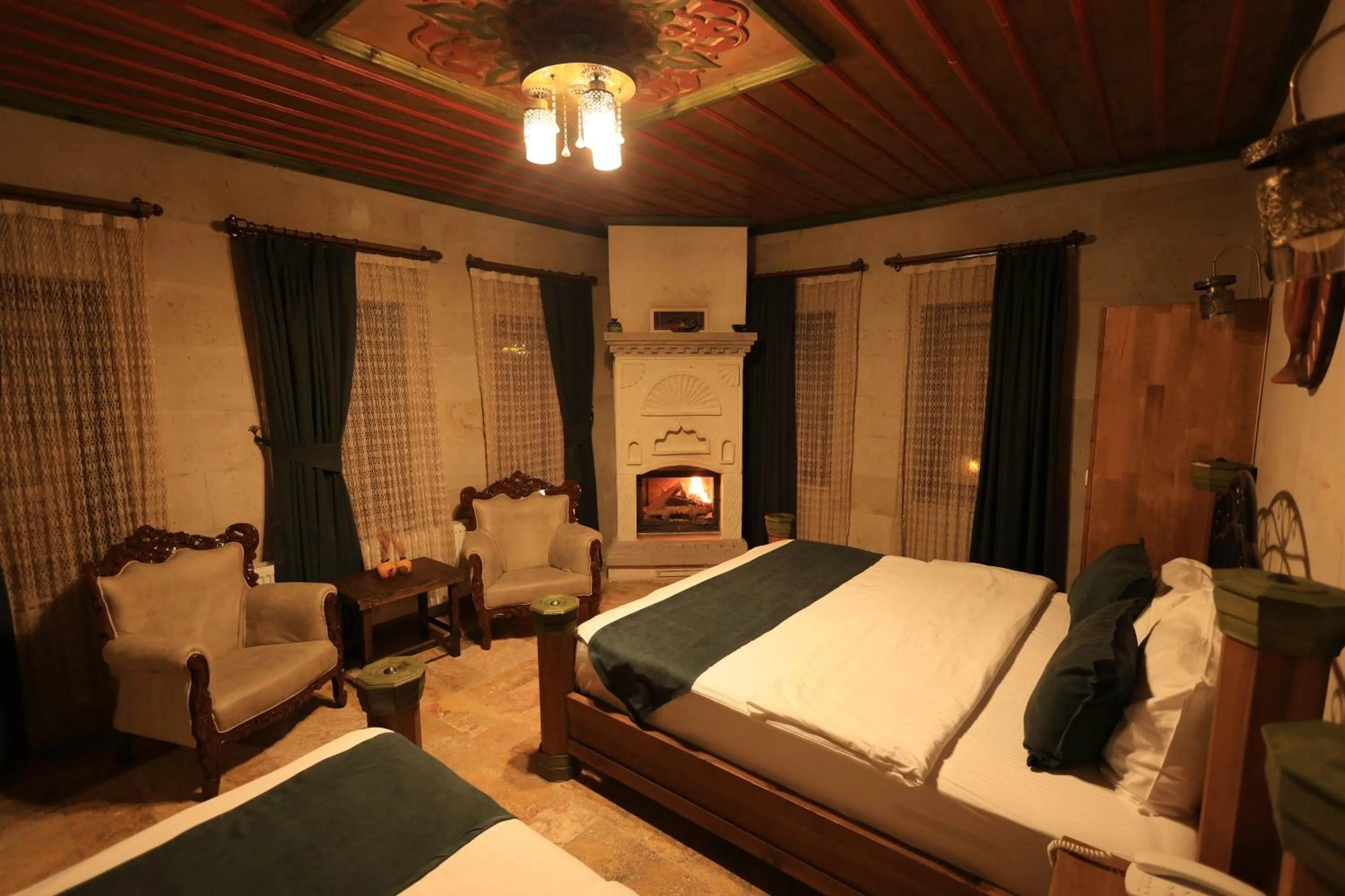 Seating area, Bed in Katapa Stone House