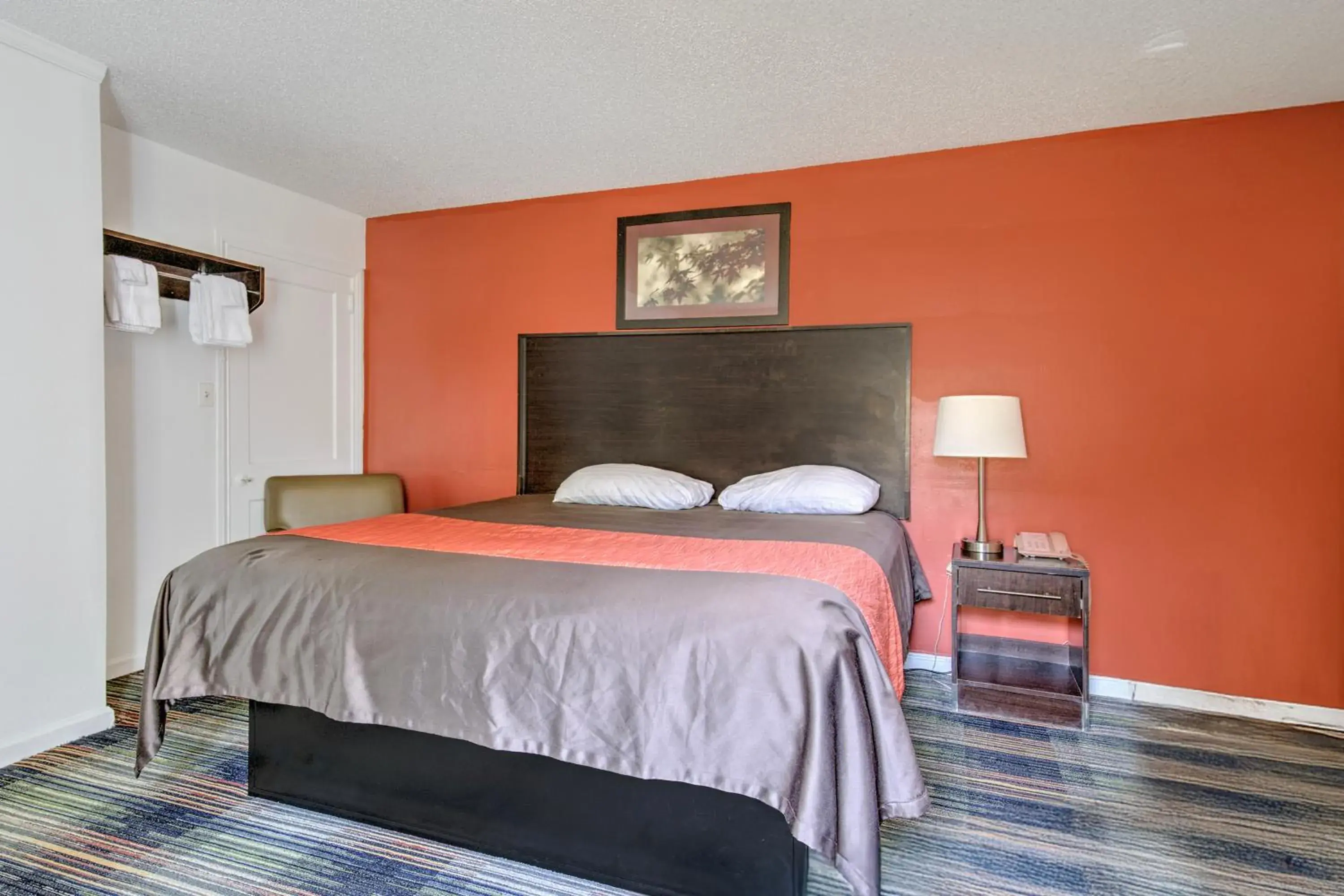 Bedroom, Bed in OYO Palm Leaf Motel Bedroom, Bed in OYO Palm Leaf Motel