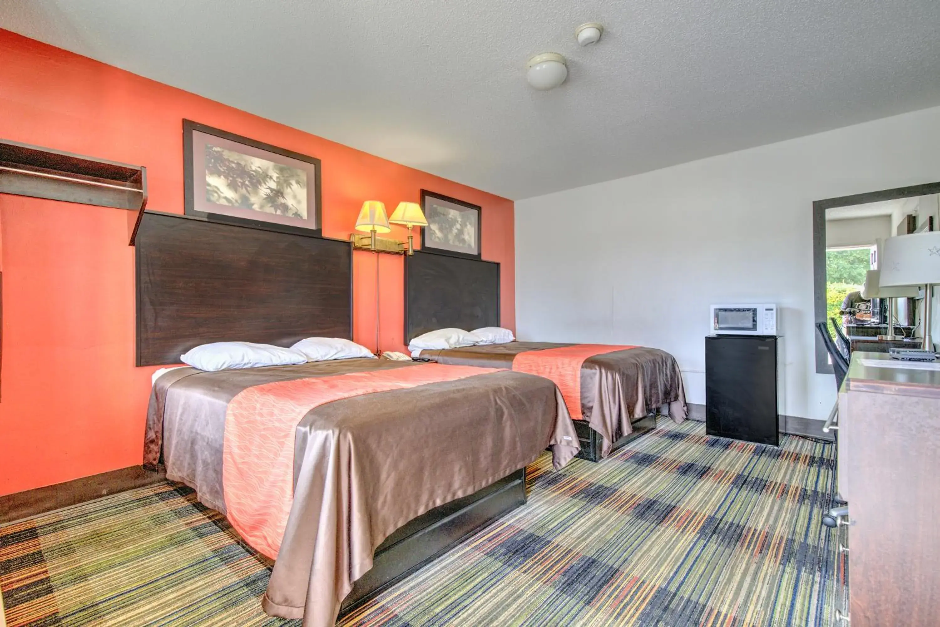 Bedroom, Bed in OYO Palm Leaf Motel Bedroom, Bed in OYO Palm Leaf Motel