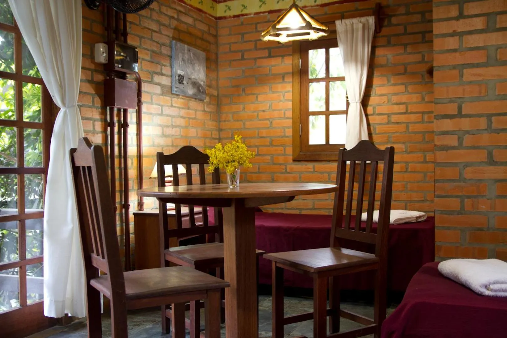 Living room in Pousada Além do Jardim