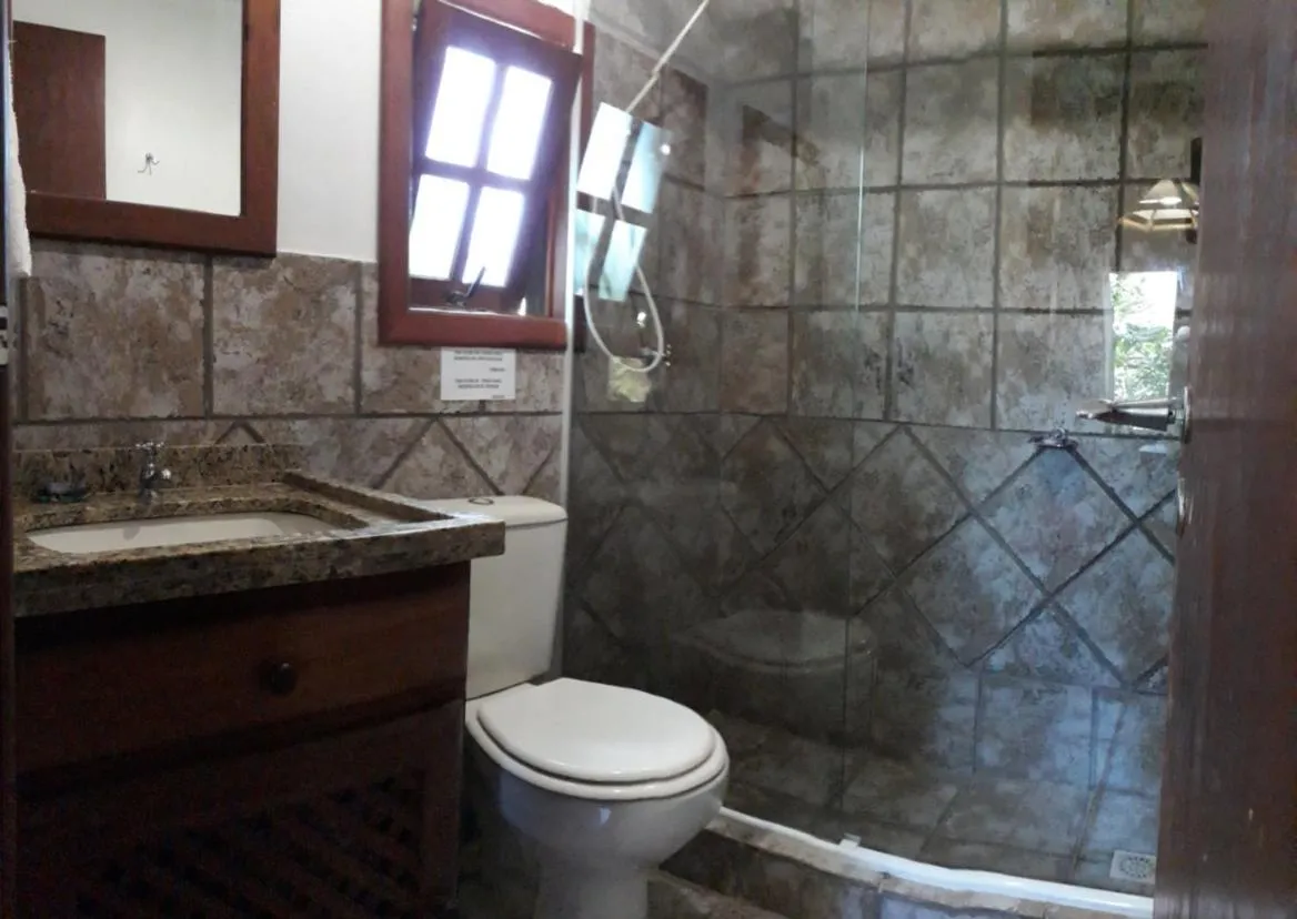 Bathroom in Pousada Além do Jardim