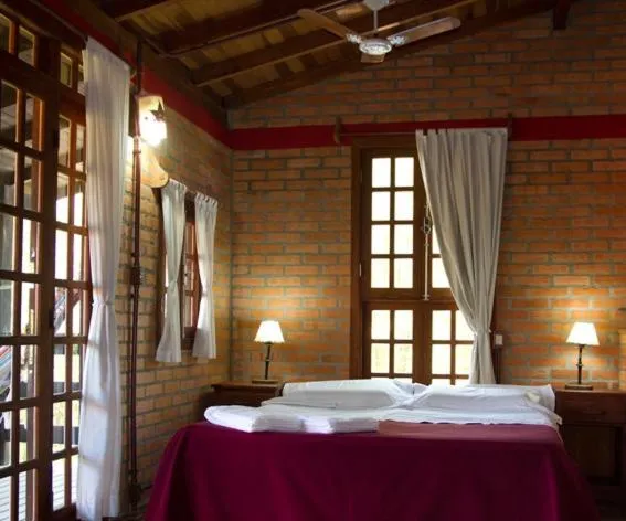 Bedroom, Bed in Pousada Além do Jardim