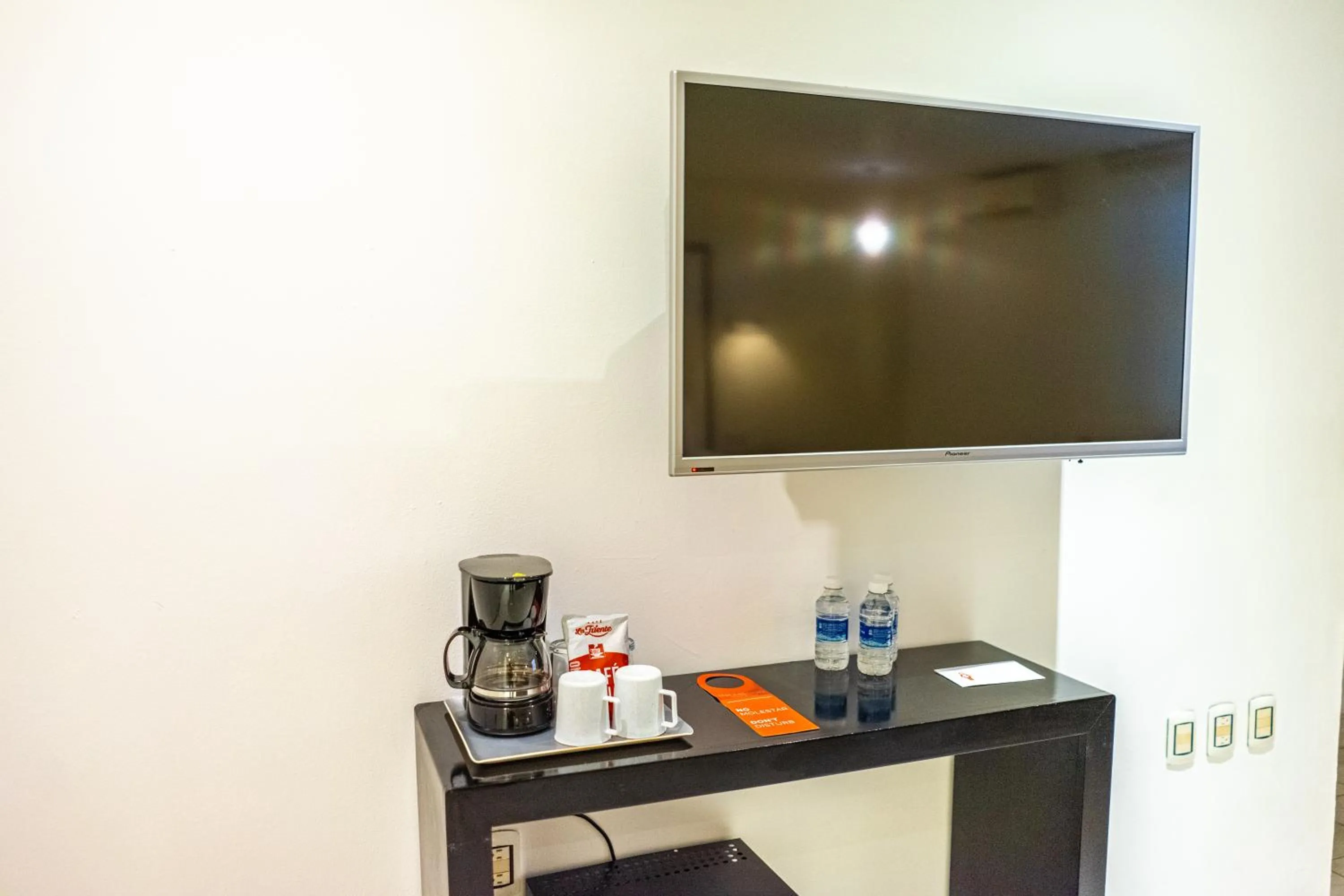 TV and multimedia in In Fashion Hotel & Spa