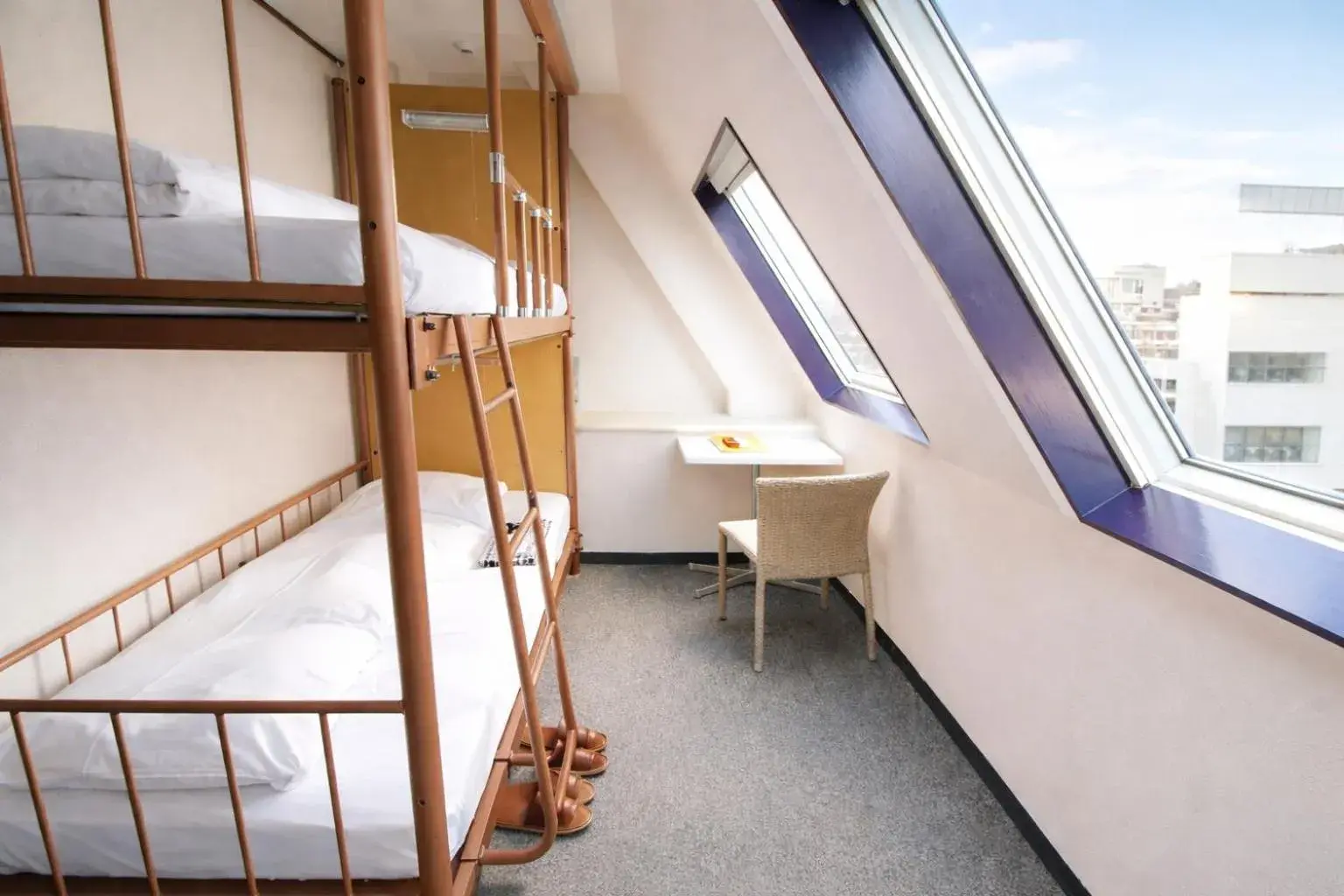 Bed in Sakura Hotel Jimbocho Bed in Sakura Hotel Jimbocho