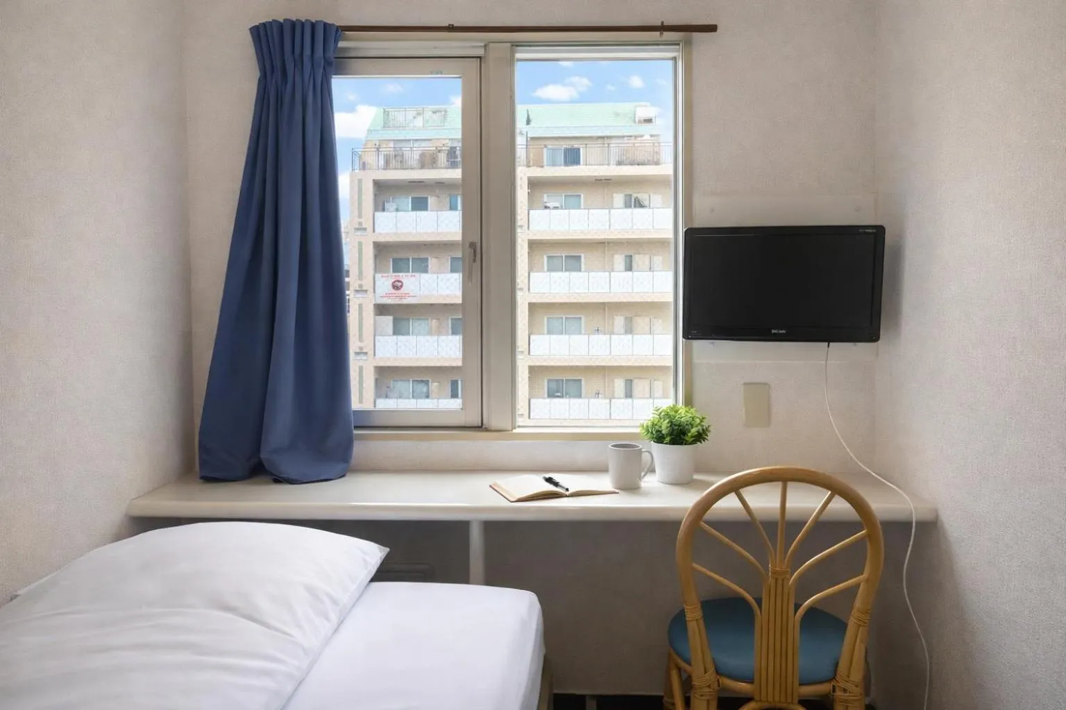 Photo of the whole room, Bed in Sakura Hotel Jimbocho