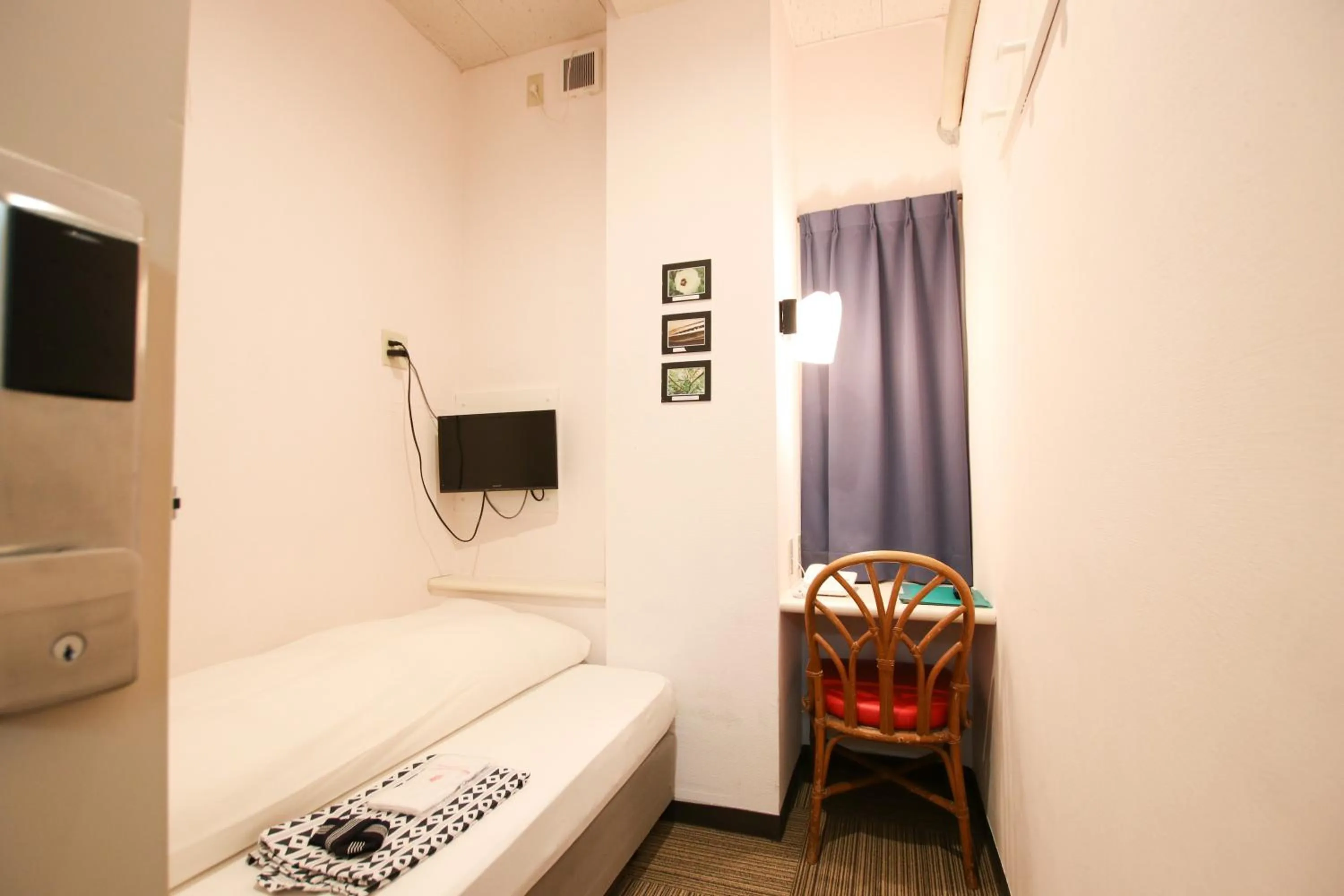 Photo of the whole room, Bed in Sakura Hotel Jimbocho