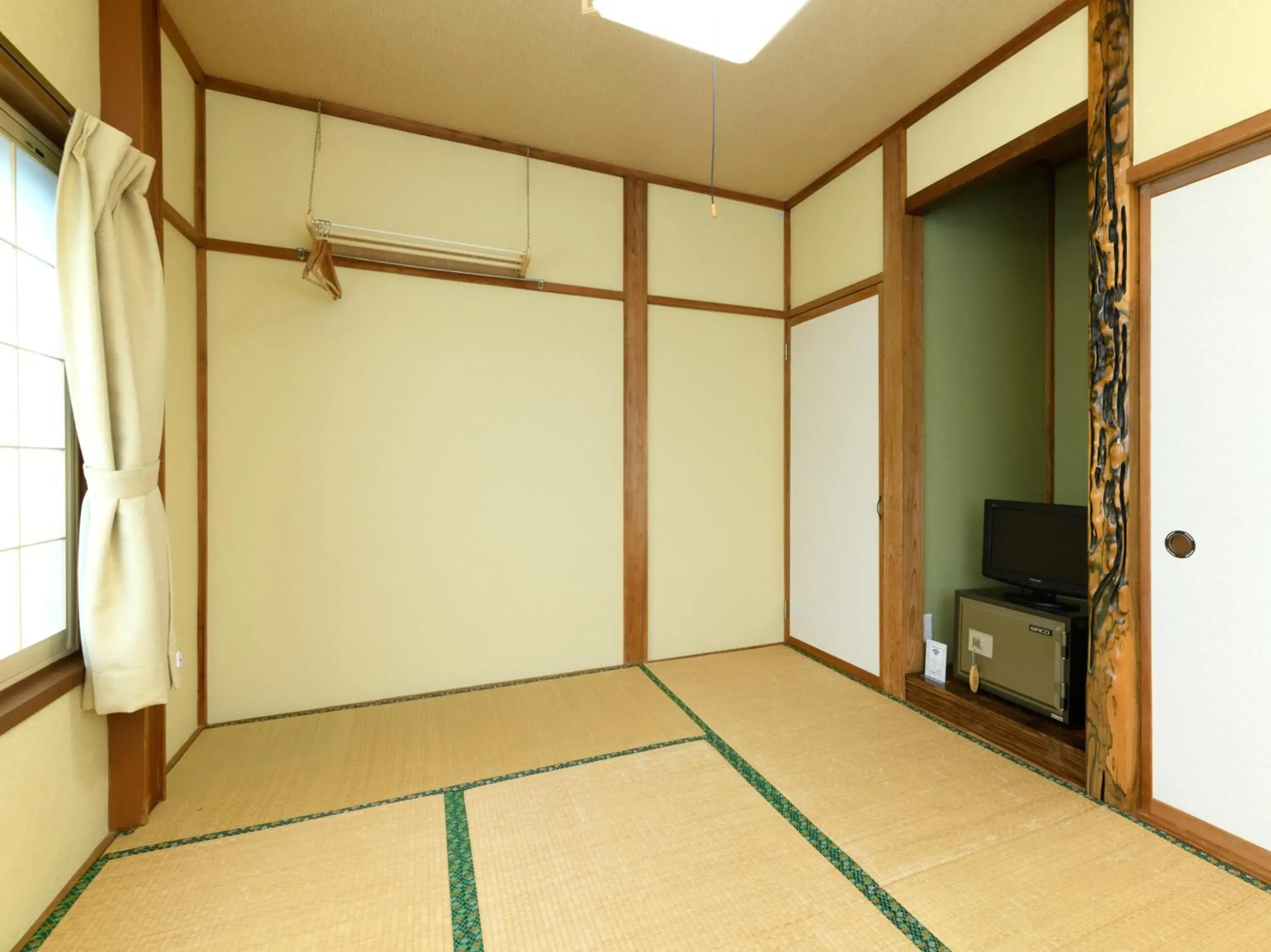 Twin Room with Shared Bathroom - single occupancy in Tabataya Twin Room with Shared Bathroom - single occupancy in Tabataya