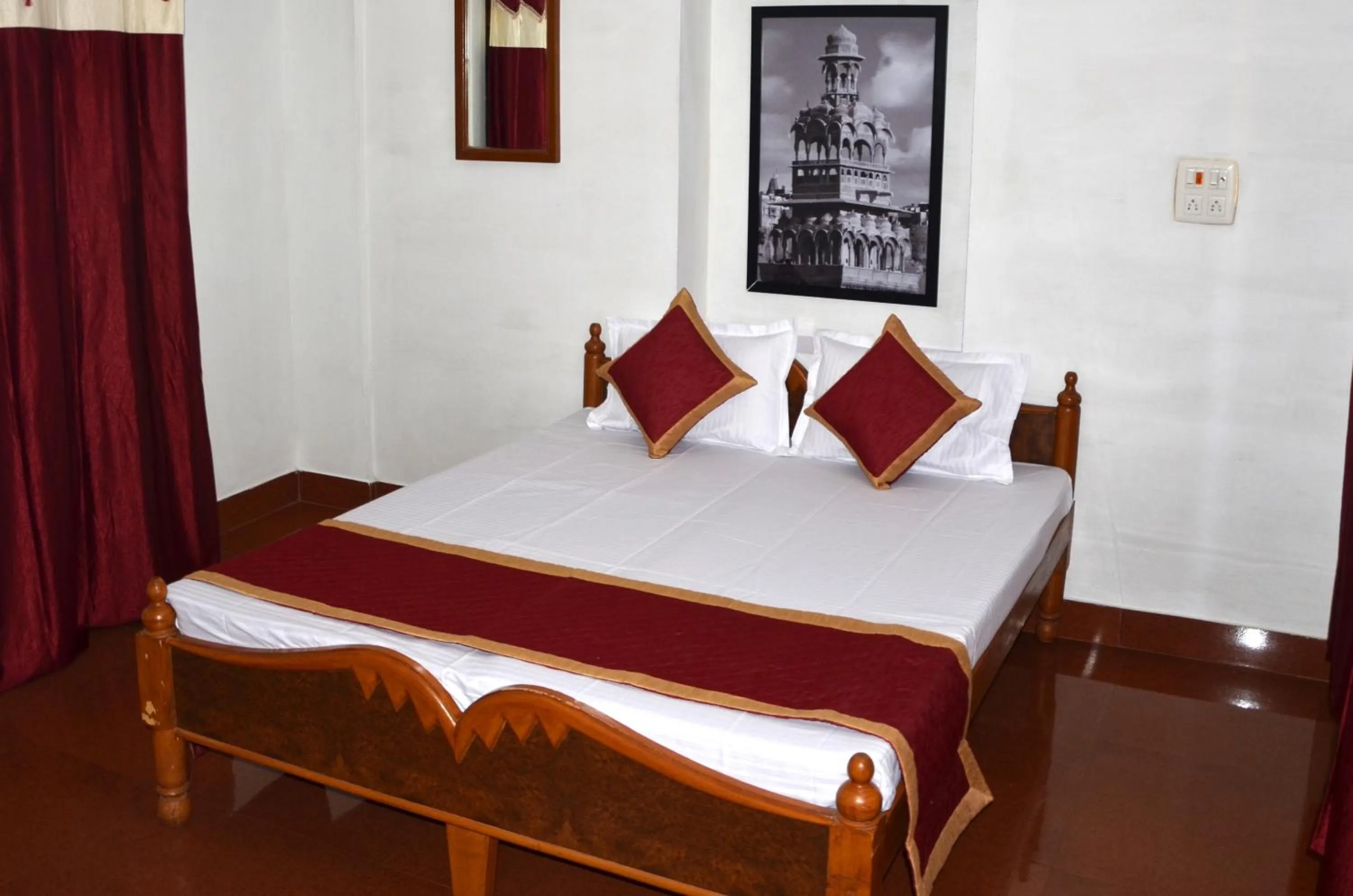 Bed in Gajanand Guest House