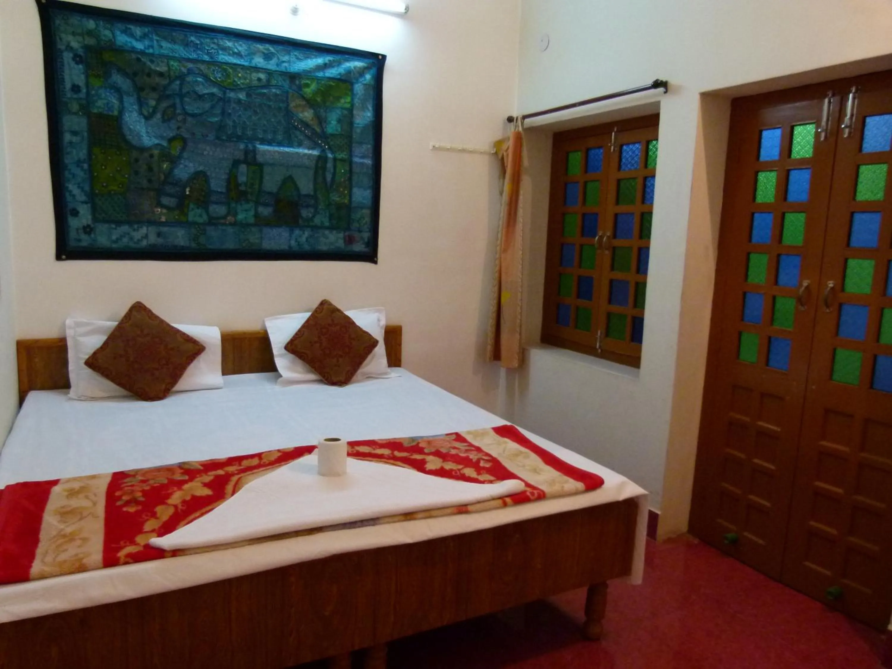 Bed in Gajanand Guest House