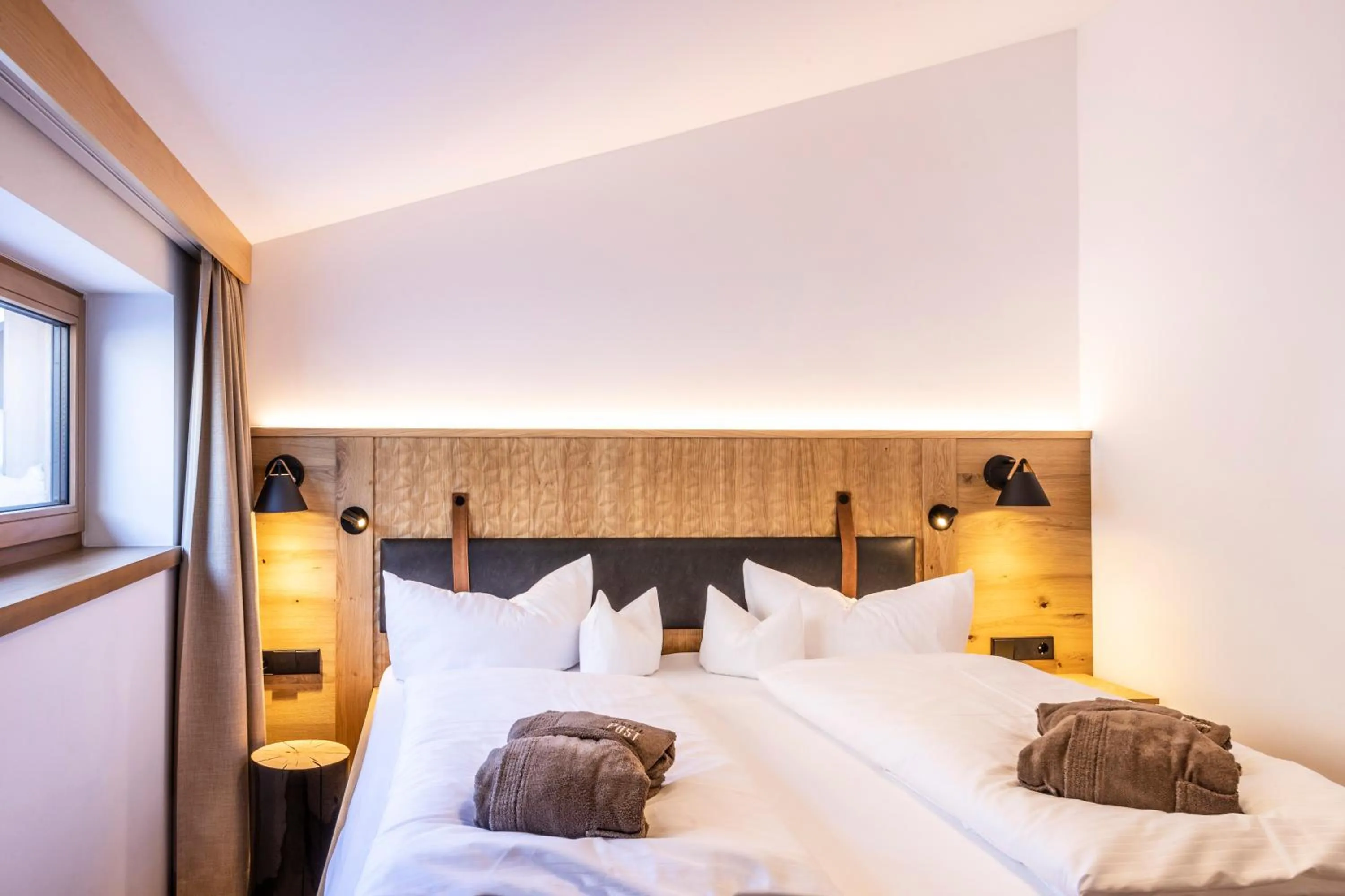 Bed in Alpen Hotel Post