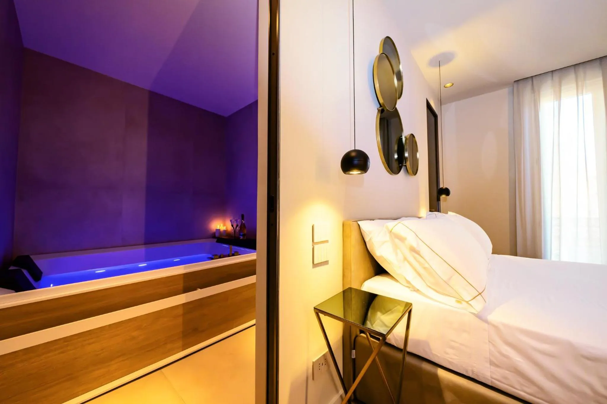 Bed in Elite Accommodations & Hydromassage Pool