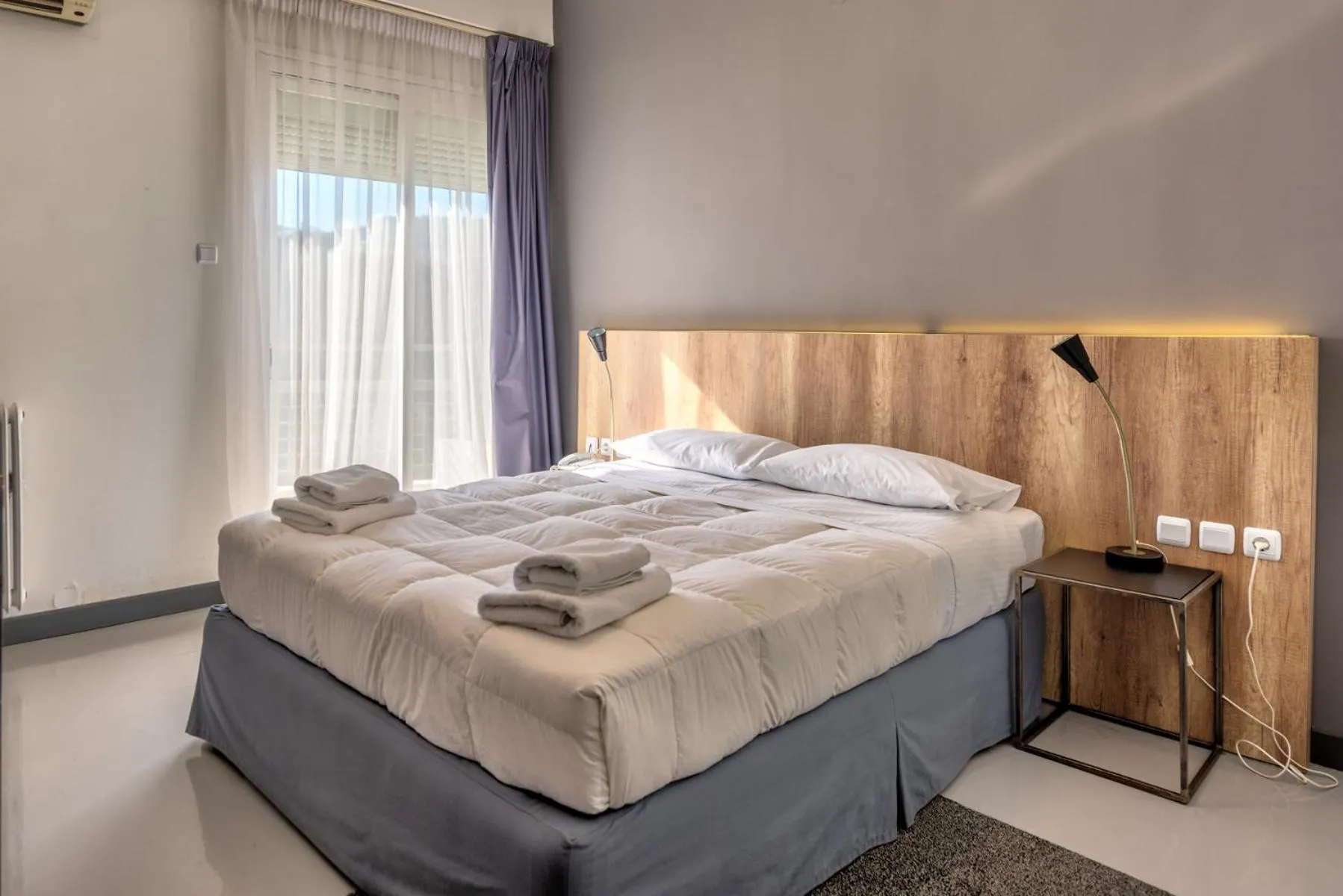 Bed in Alexios Hotel