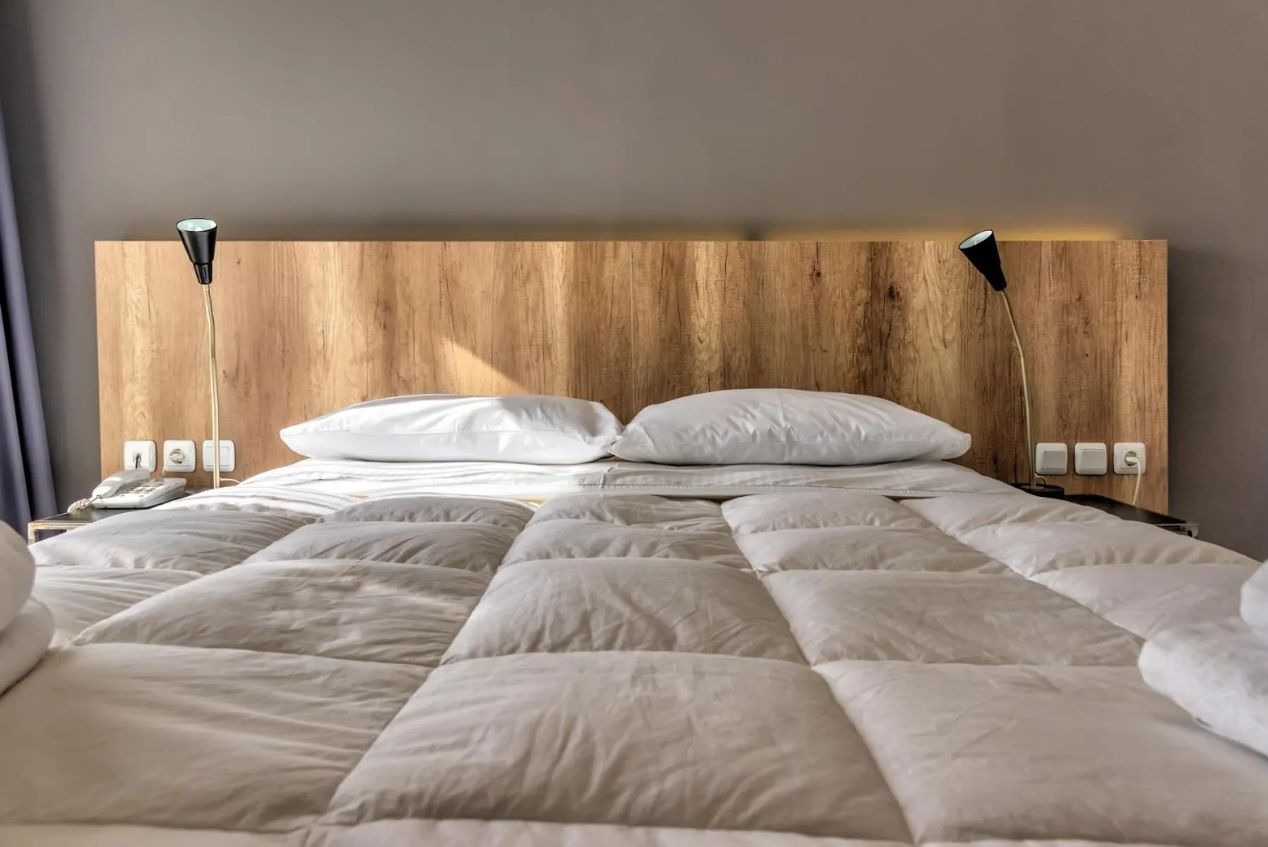 Bed in Alexios Hotel