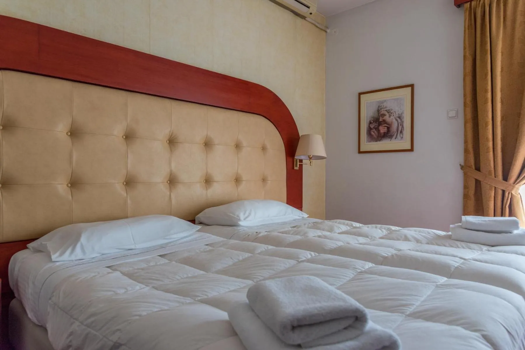 Bed in Alexios Hotel