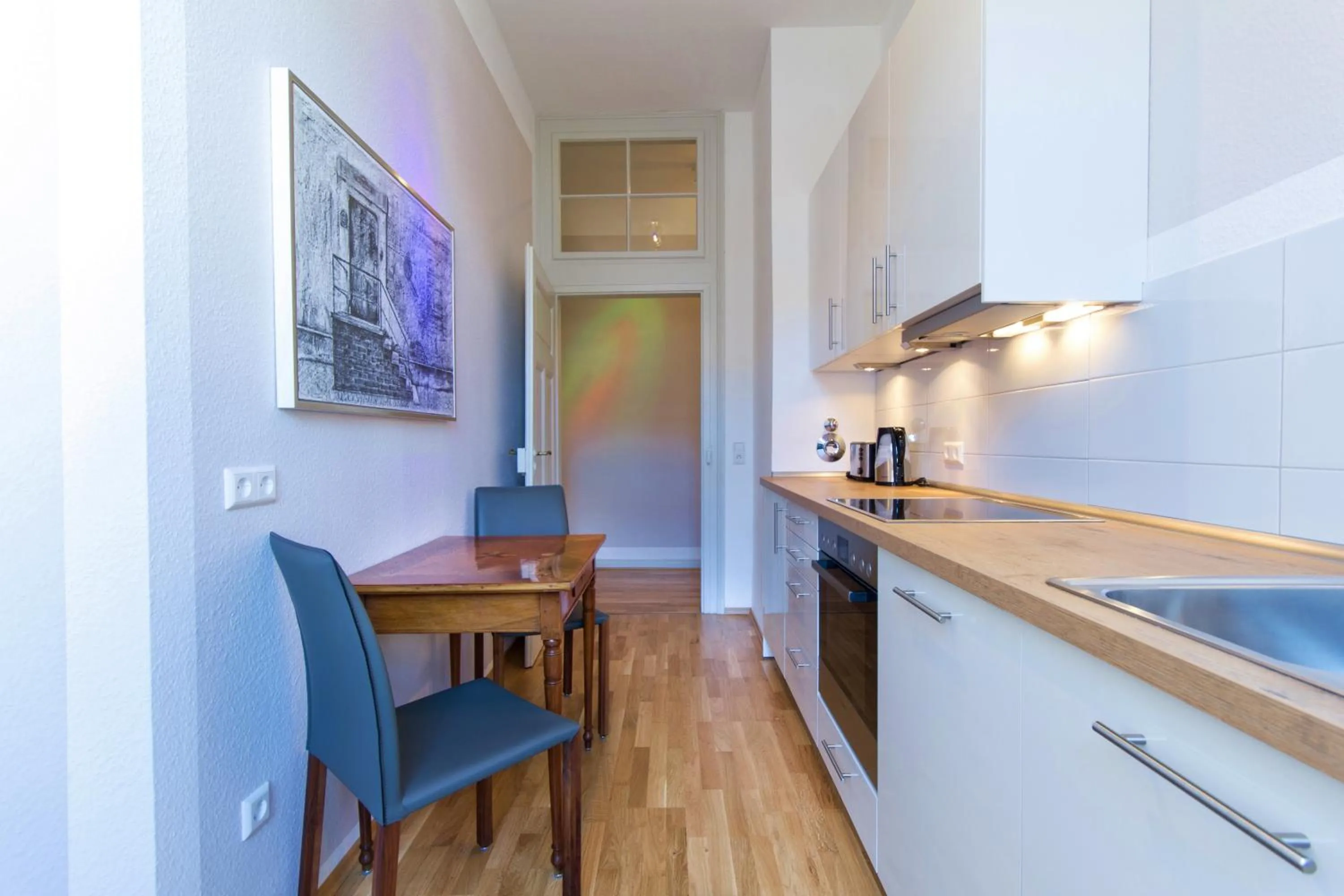 Kitchen or kitchenette in Qube Hotel Bergheim