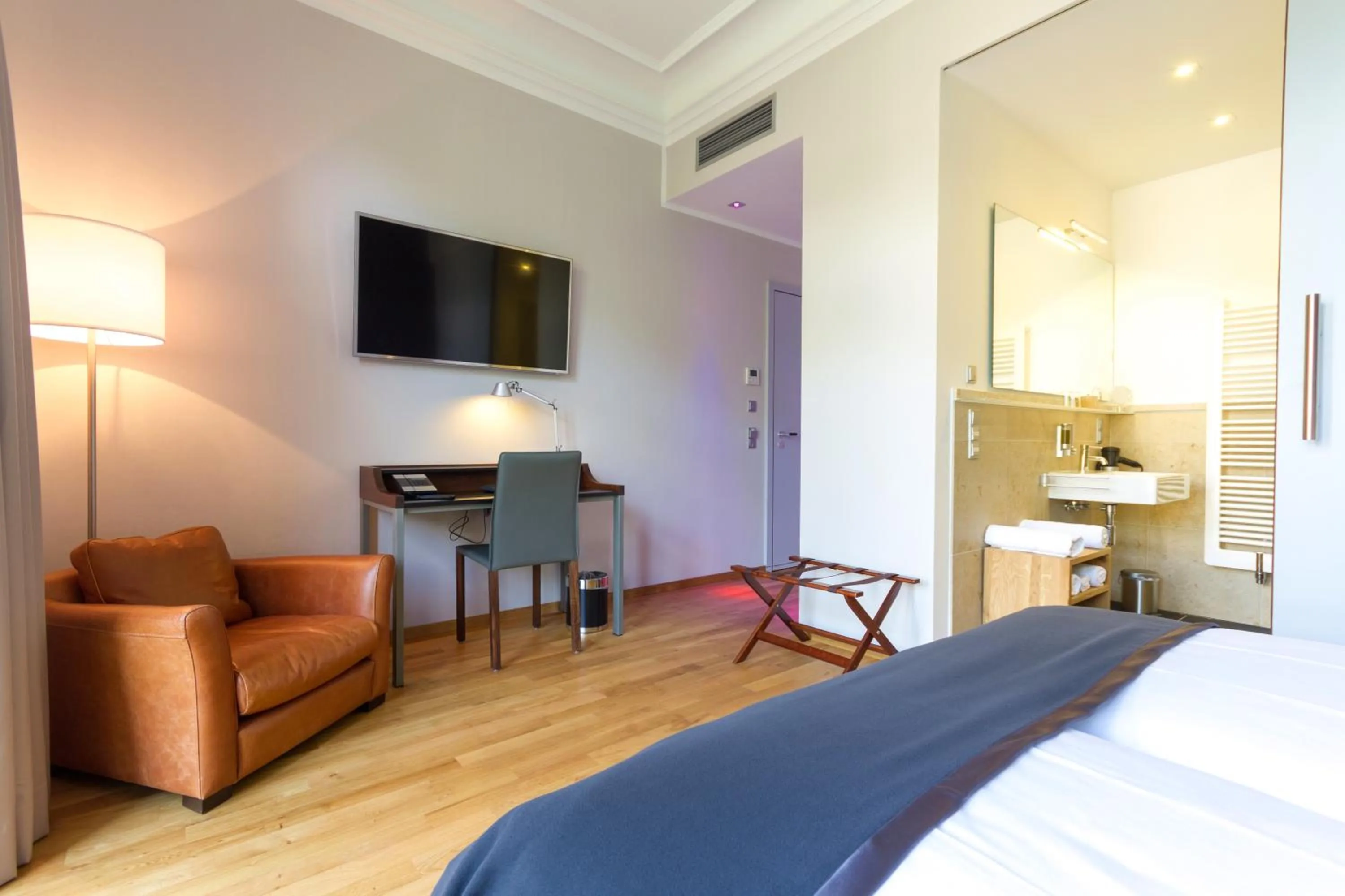 Photo of the whole room, Bed in Qube Hotel Bergheim