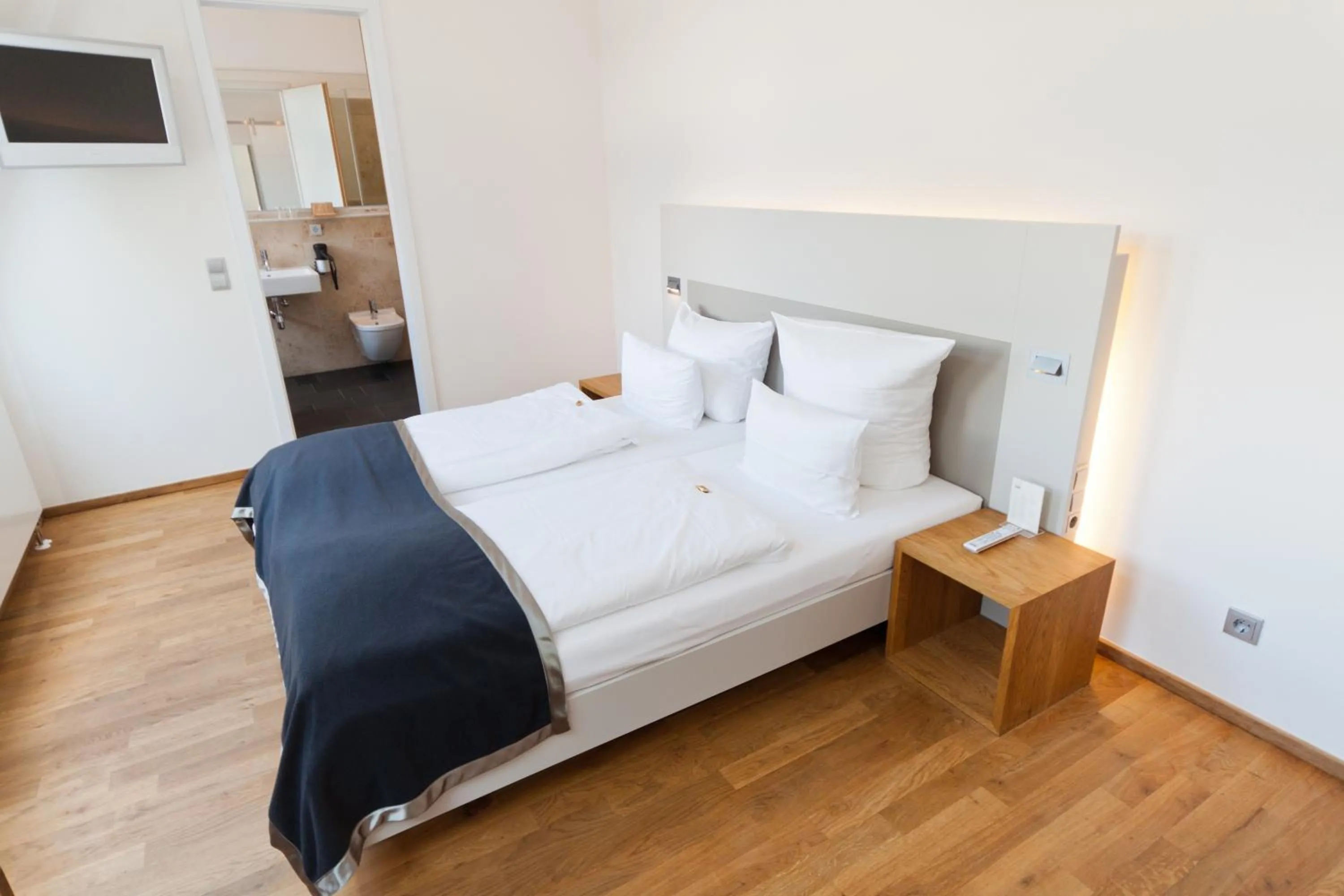 Bed in Qube Hotel Bergheim