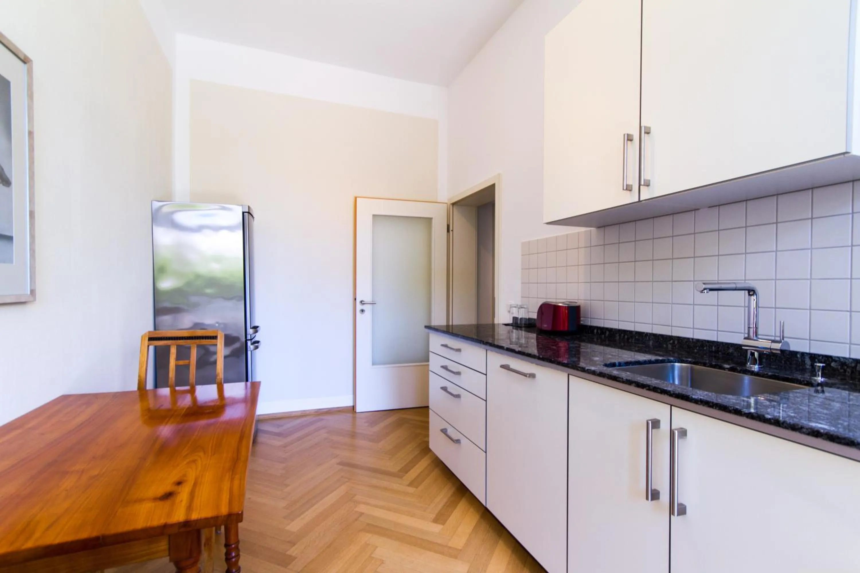 Kitchen or kitchenette in Qube Hotel Bergheim