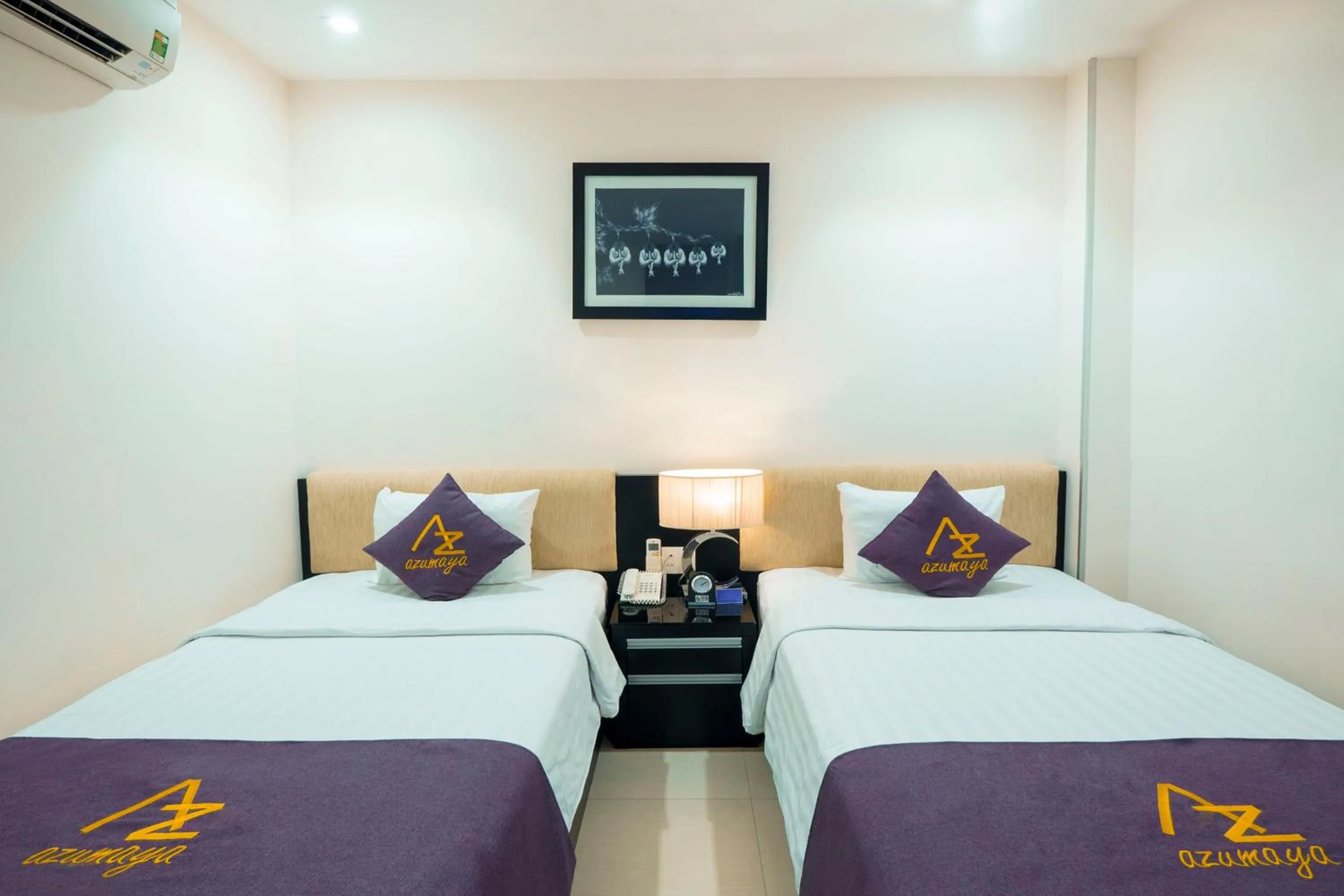 Bed in Azumaya Hotel Da Nang