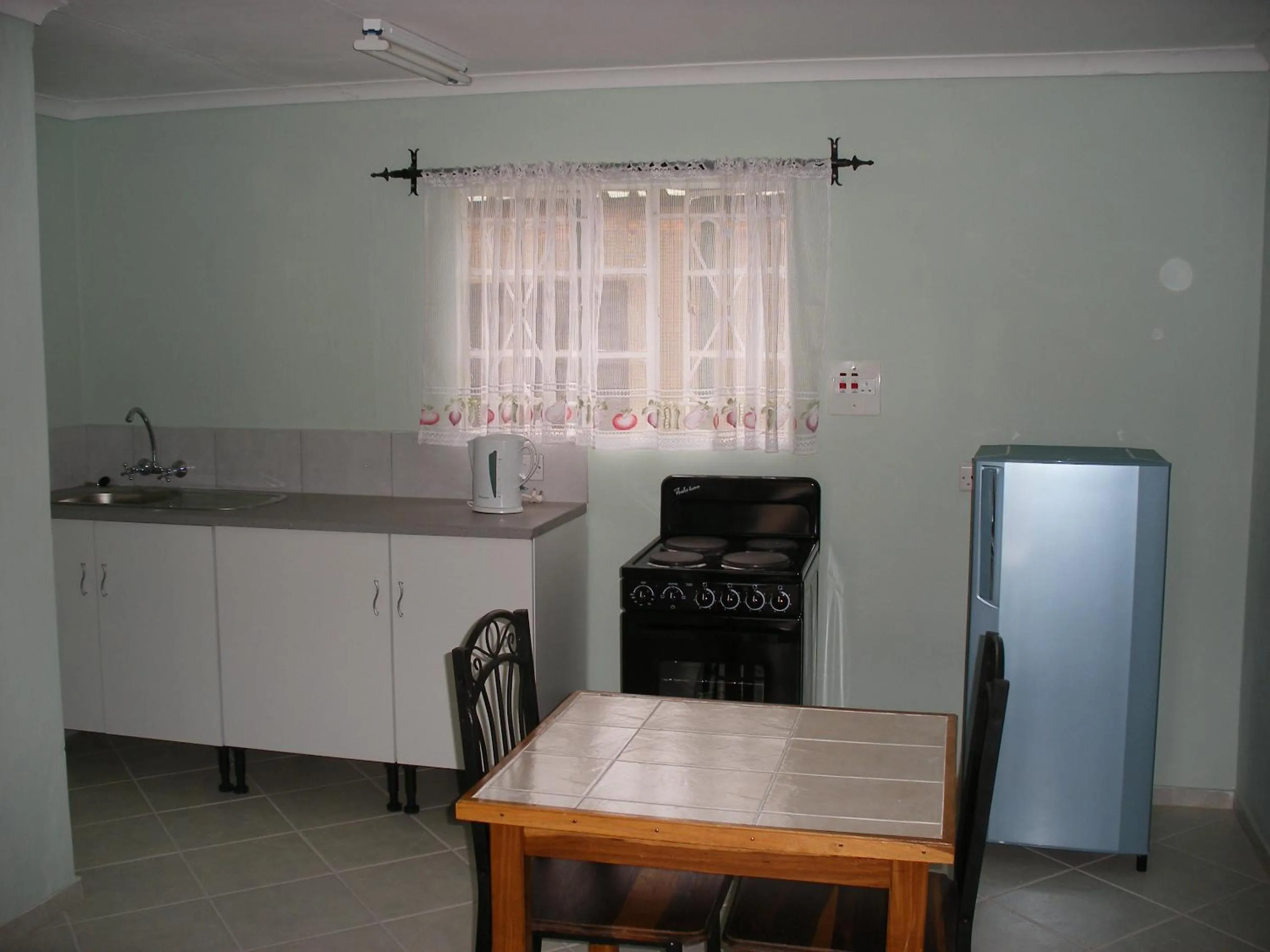 Kitchen or kitchenette in Gloria's Bed and Breakfast