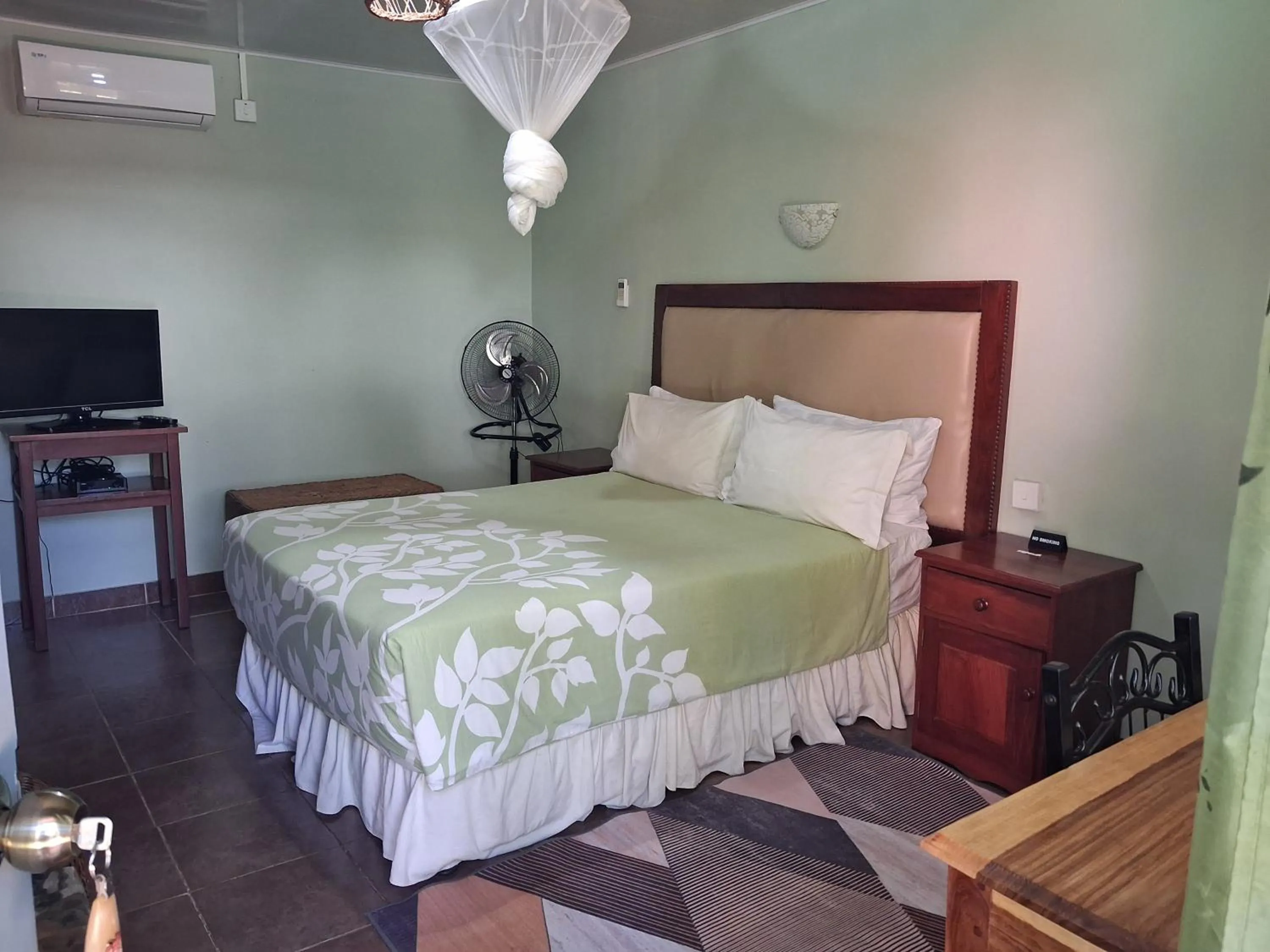 Bed in Gloria's Bed and Breakfast