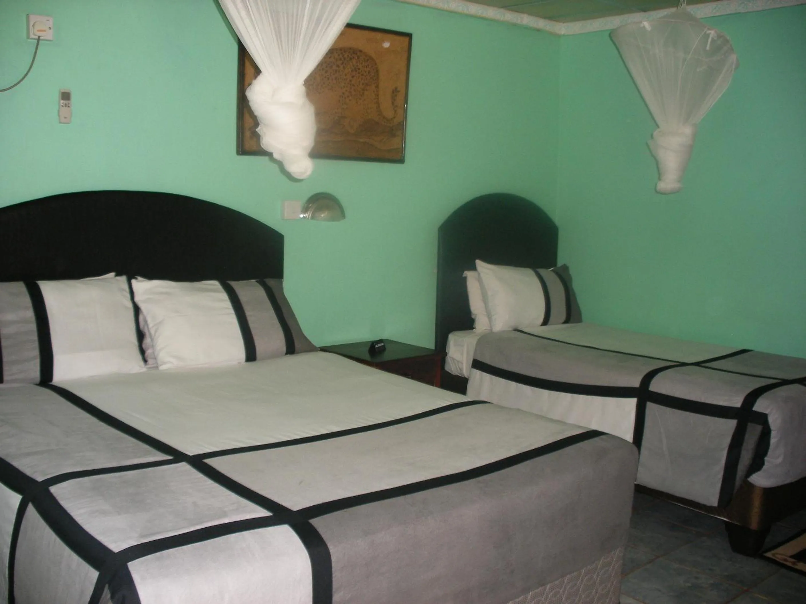 Bed in Gloria's Bed and Breakfast