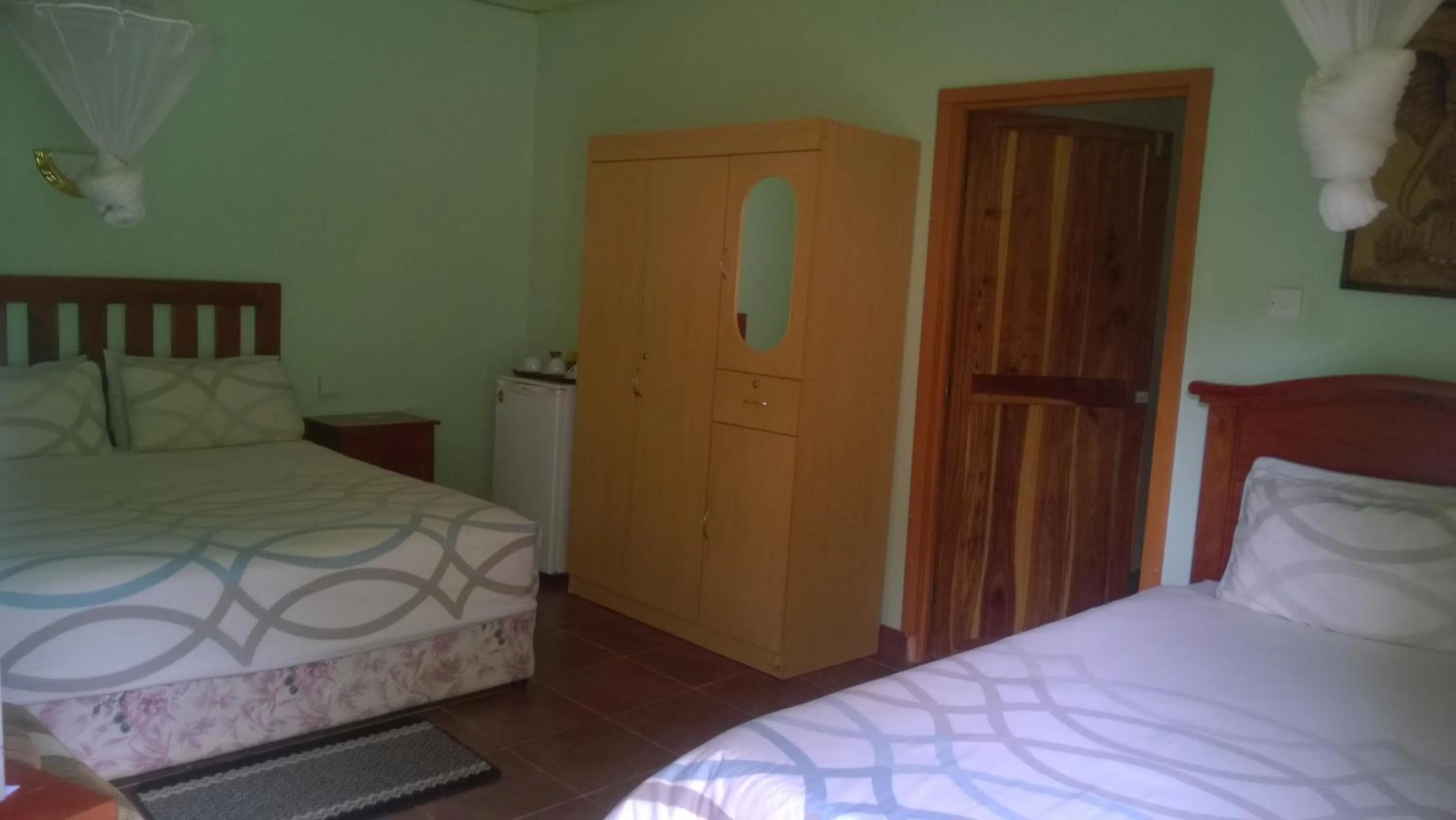 Bed in Gloria's Bed and Breakfast