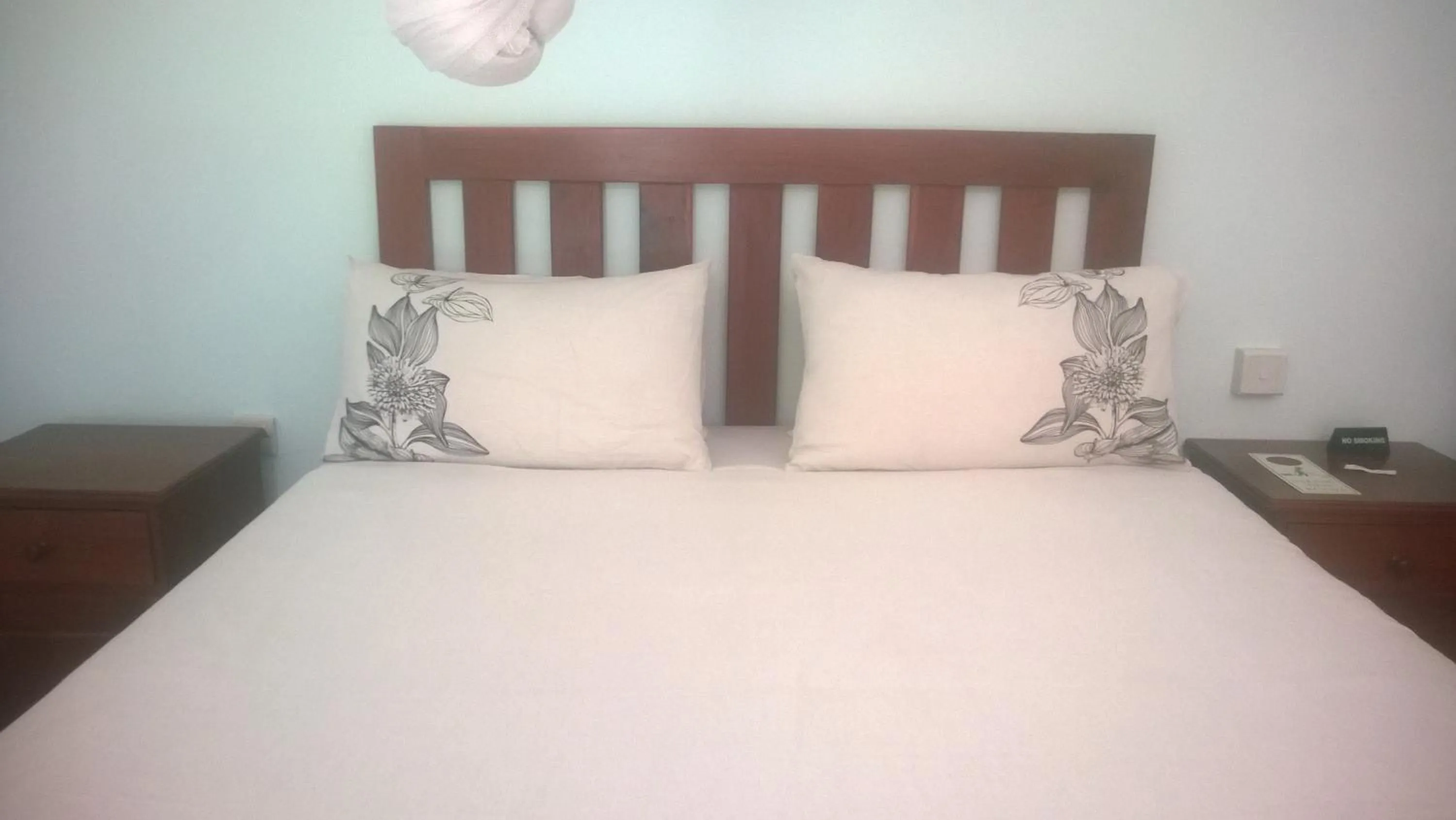 Bed in Gloria's Bed and Breakfast