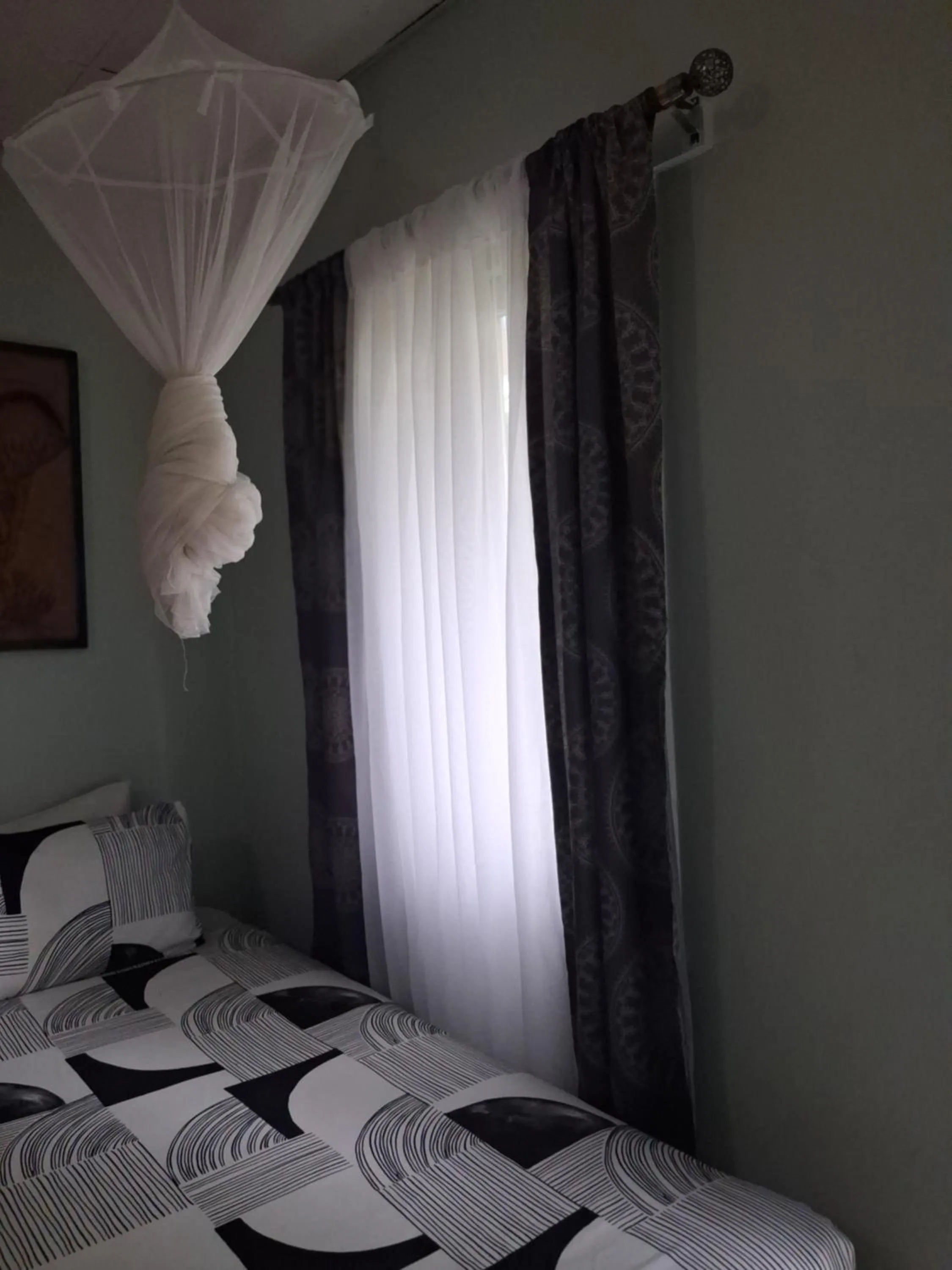 Bed in Gloria's Bed and Breakfast