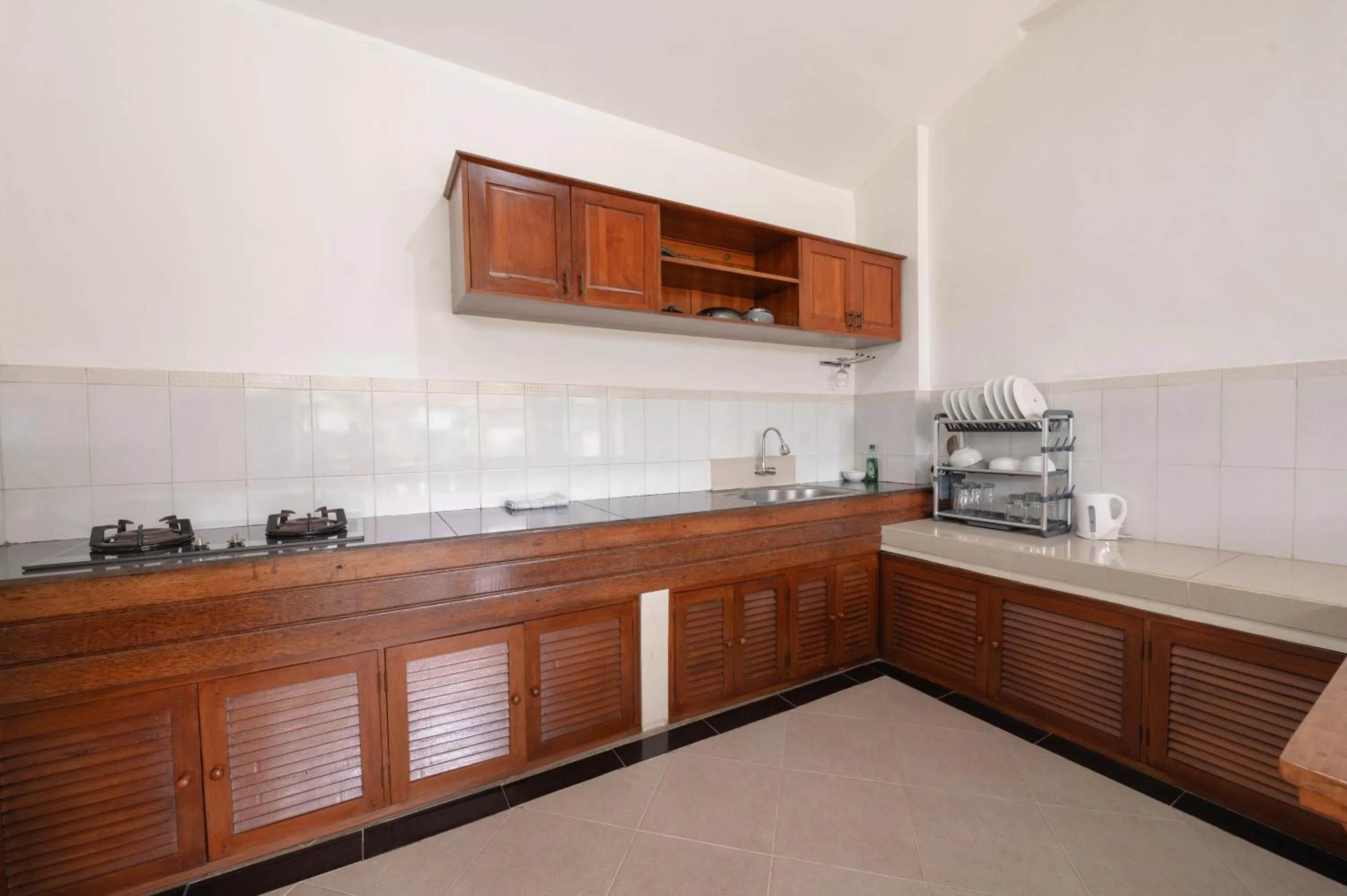 Kitchen or kitchenette in Pondok Naya Ubud