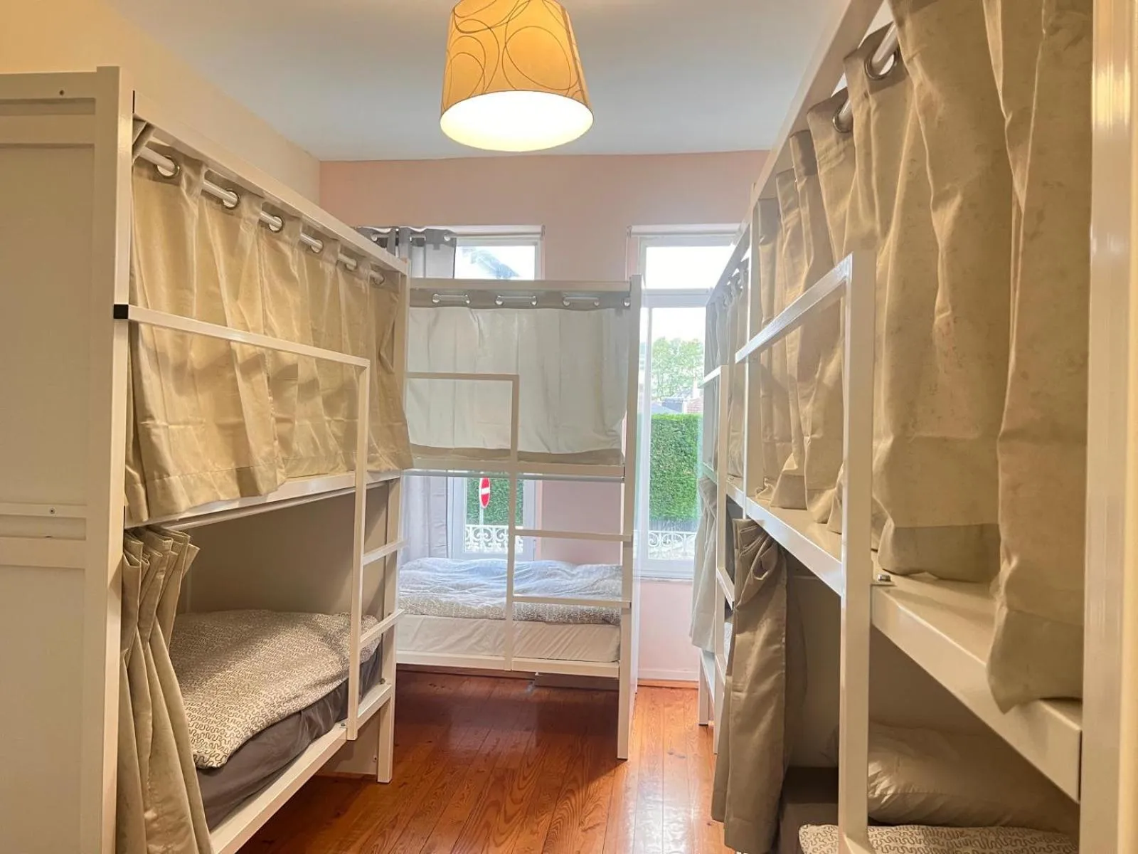 Bed in SwissPorto Guest House