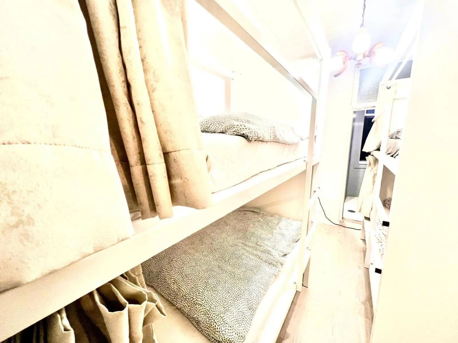 Bed in SwissPorto Guest House