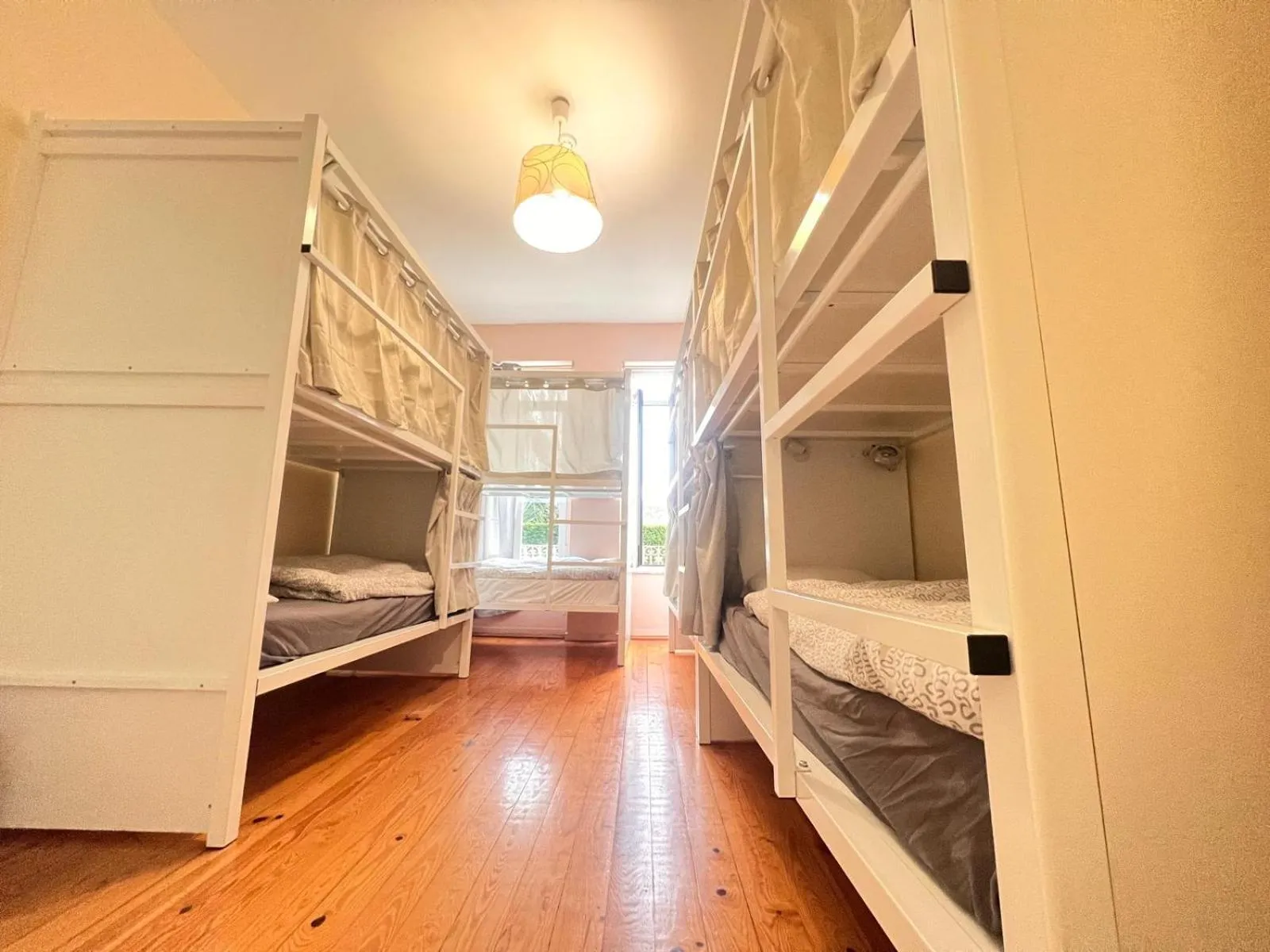 Bed in SwissPorto Guest House