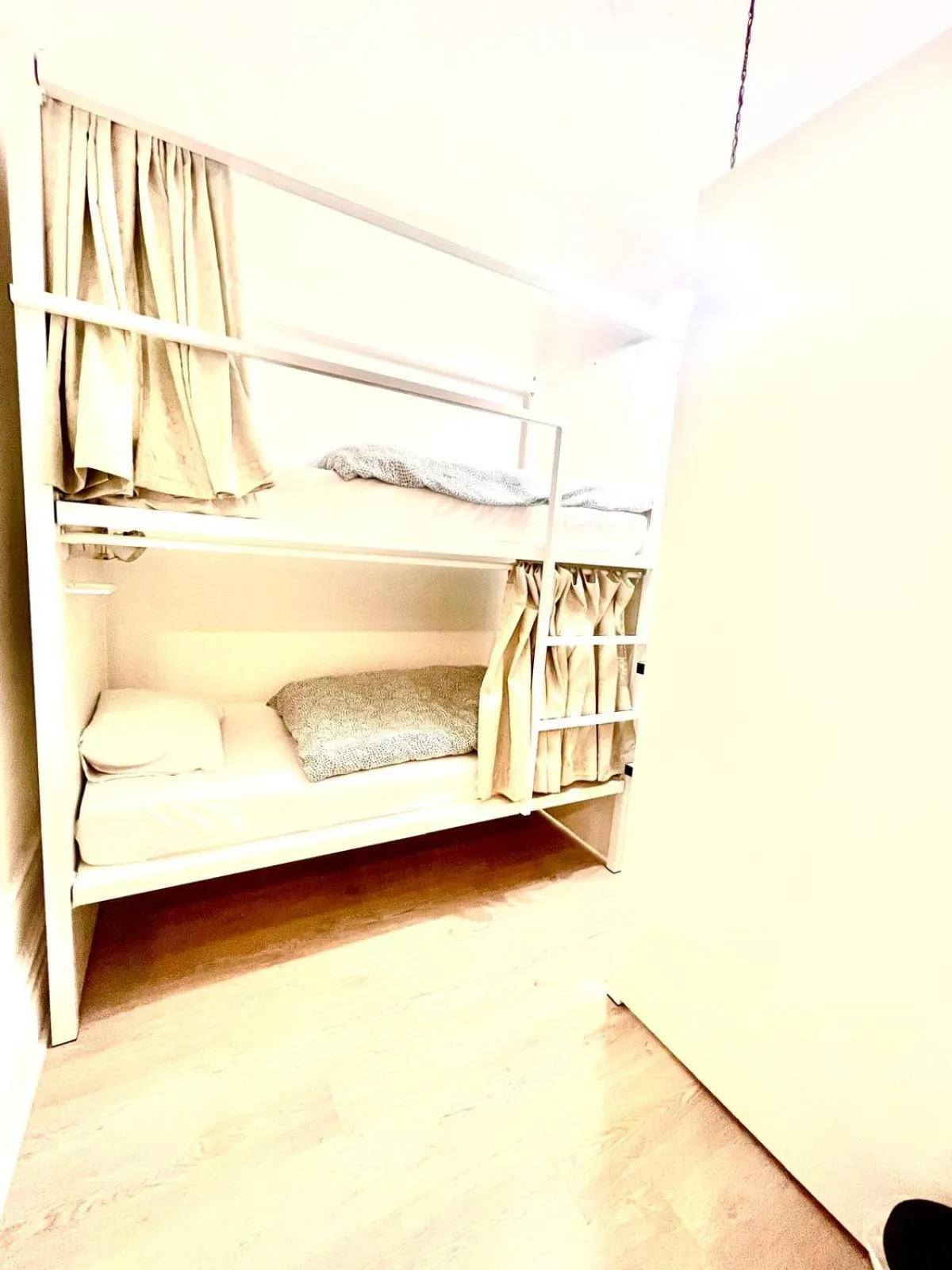 Bed in SwissPorto Guest House