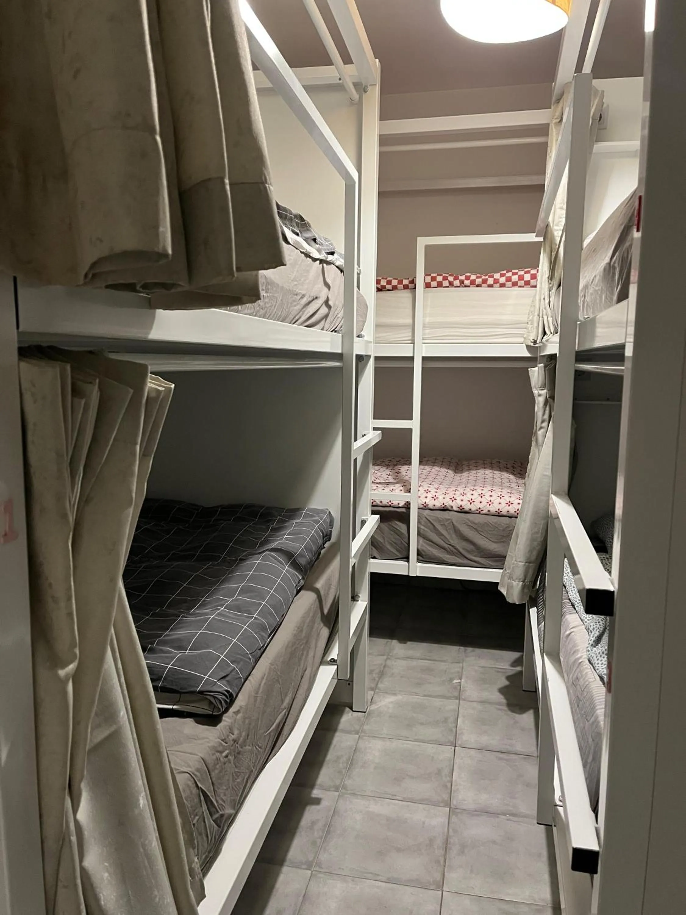 Bed in SwissPorto Guest House